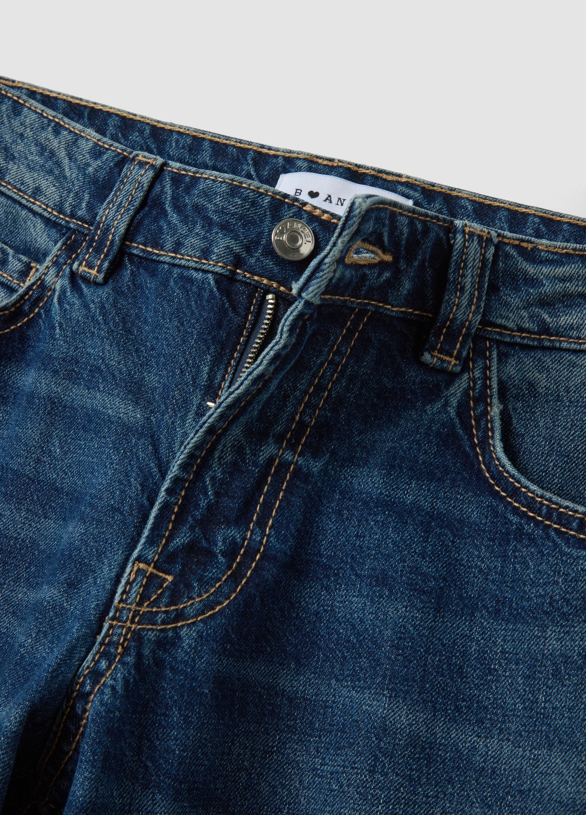 Blue denim jeans in 100% cotton with super wide-leg fit