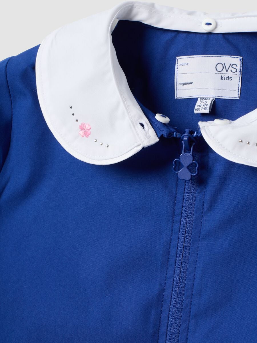 Blue girls&rsquo; school apron with rhinestone details and floral embroidery_2