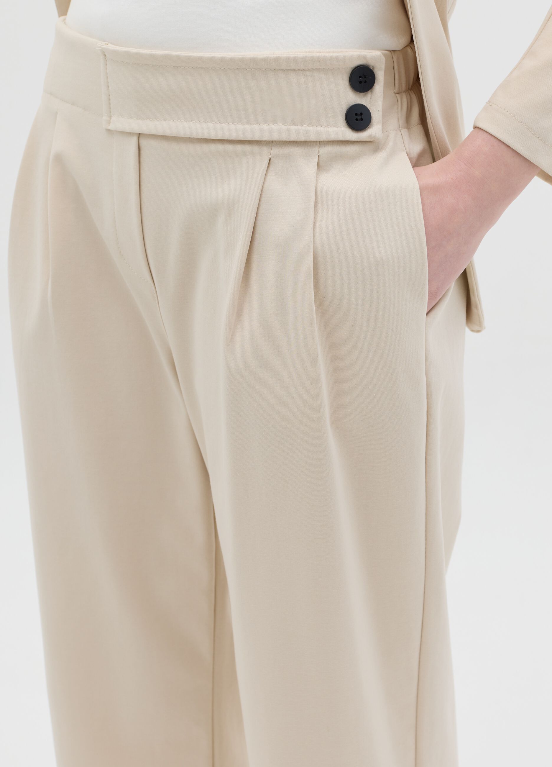 Beige trousers with darts
