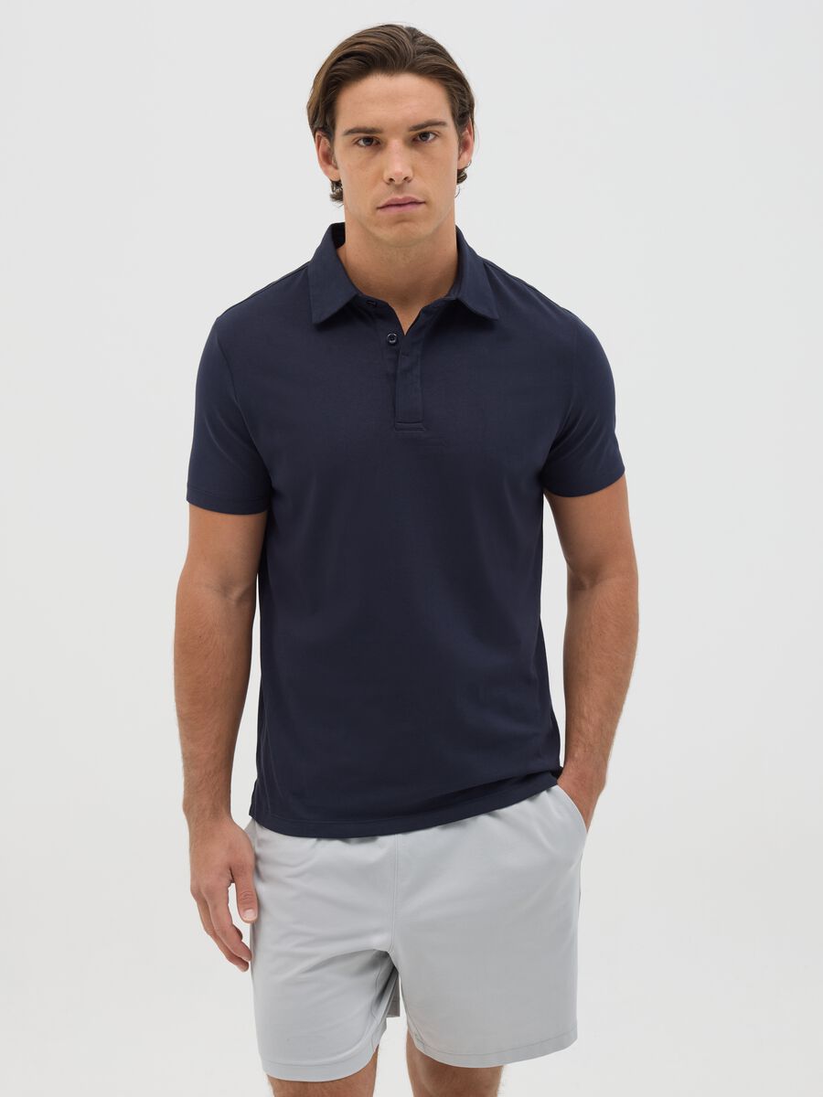 Blue polo shirt in technical fabric_0