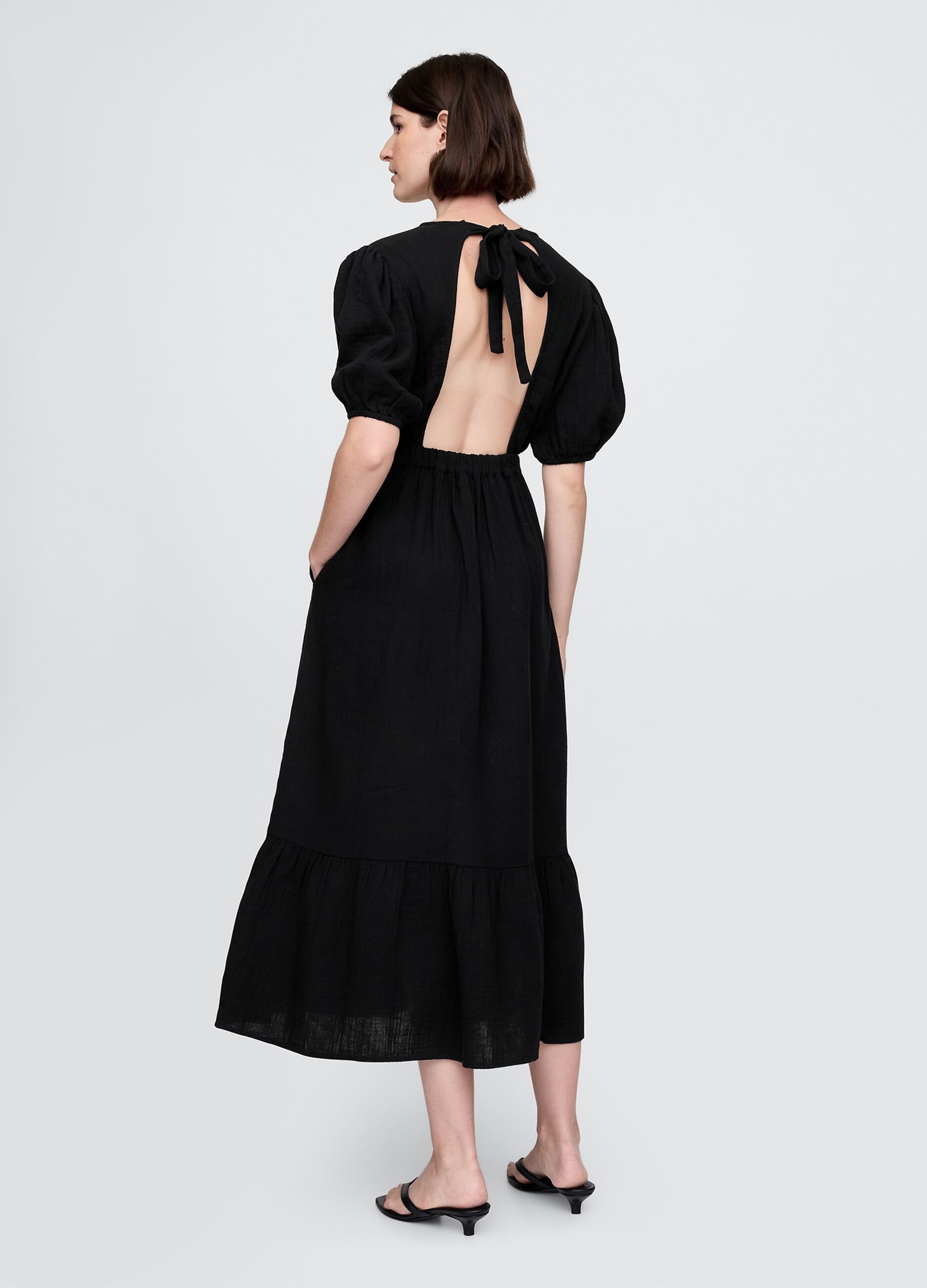 Long black dress with V-neck and open back