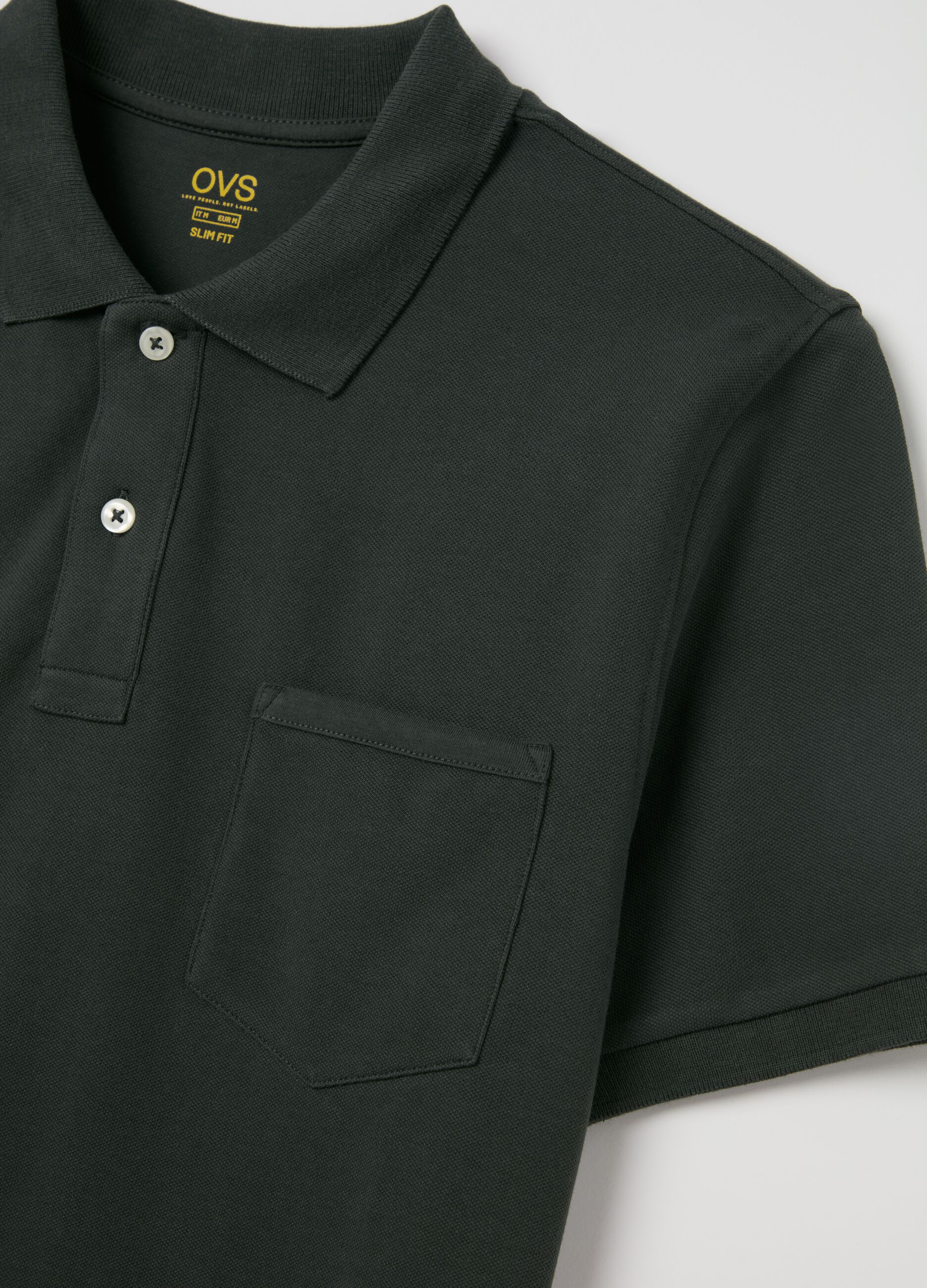 Polo in cotone stretch con tasca 