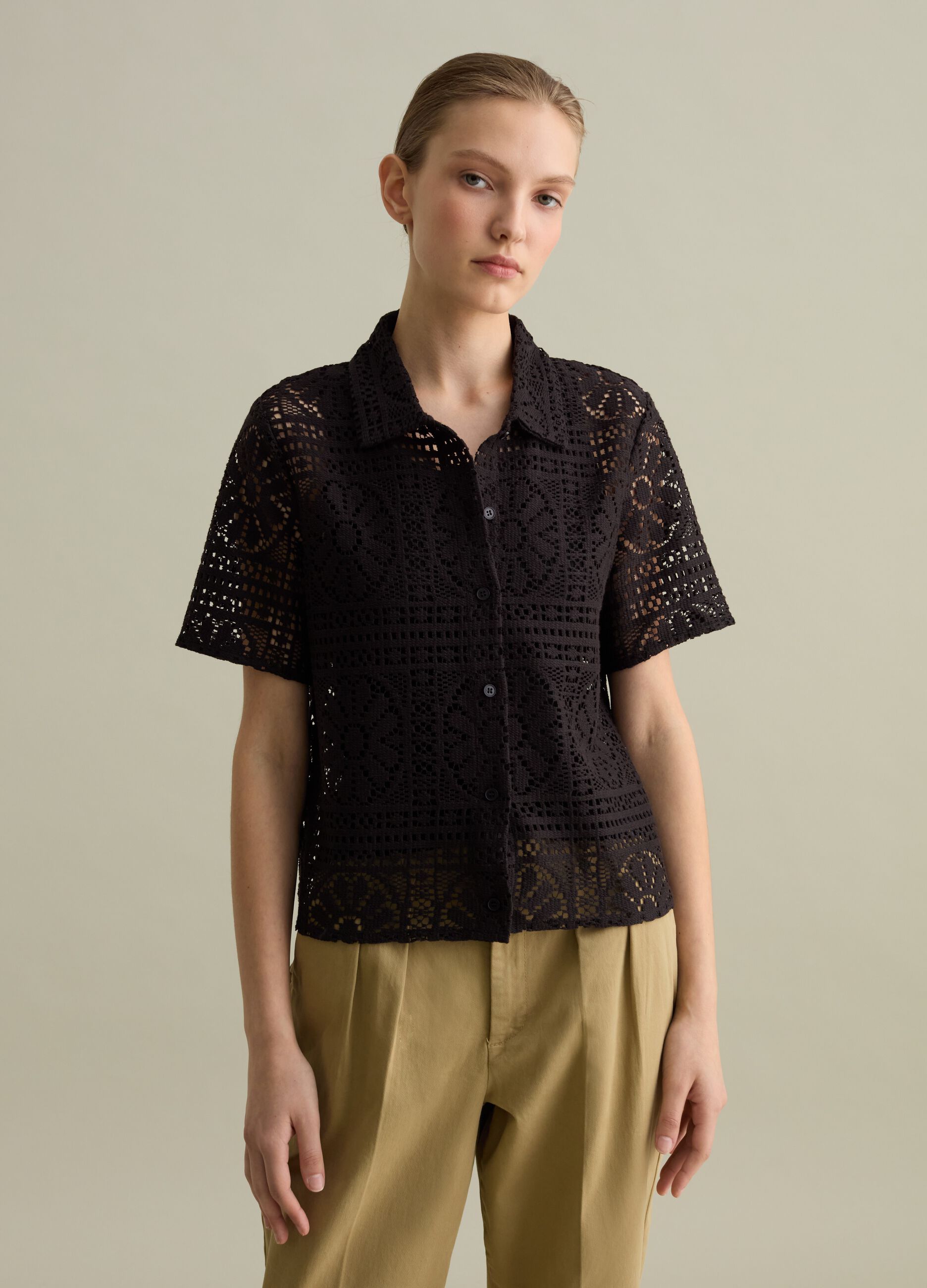 Black polo shirt in lace