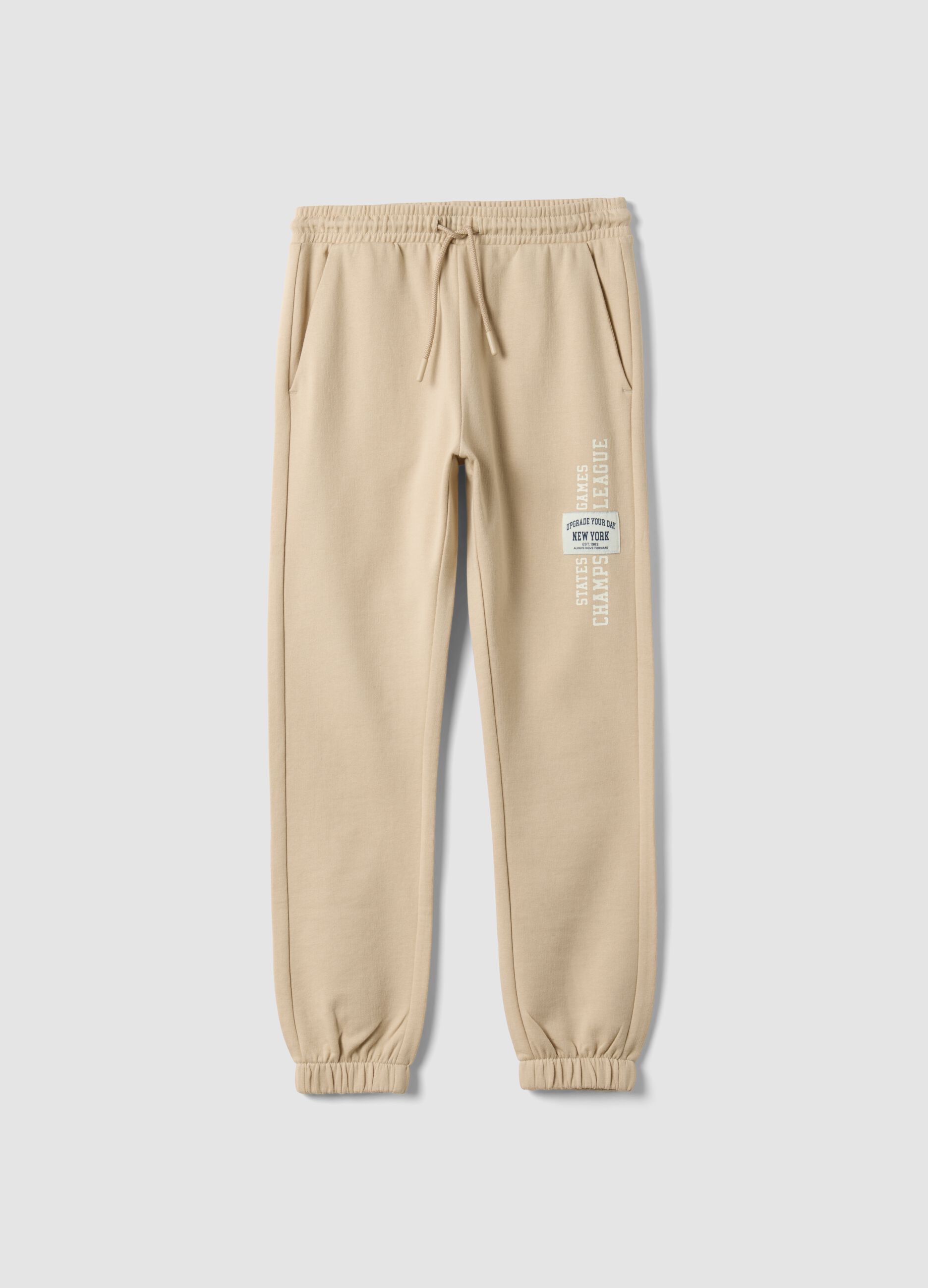 Beige pure cotton joggers with print for boys