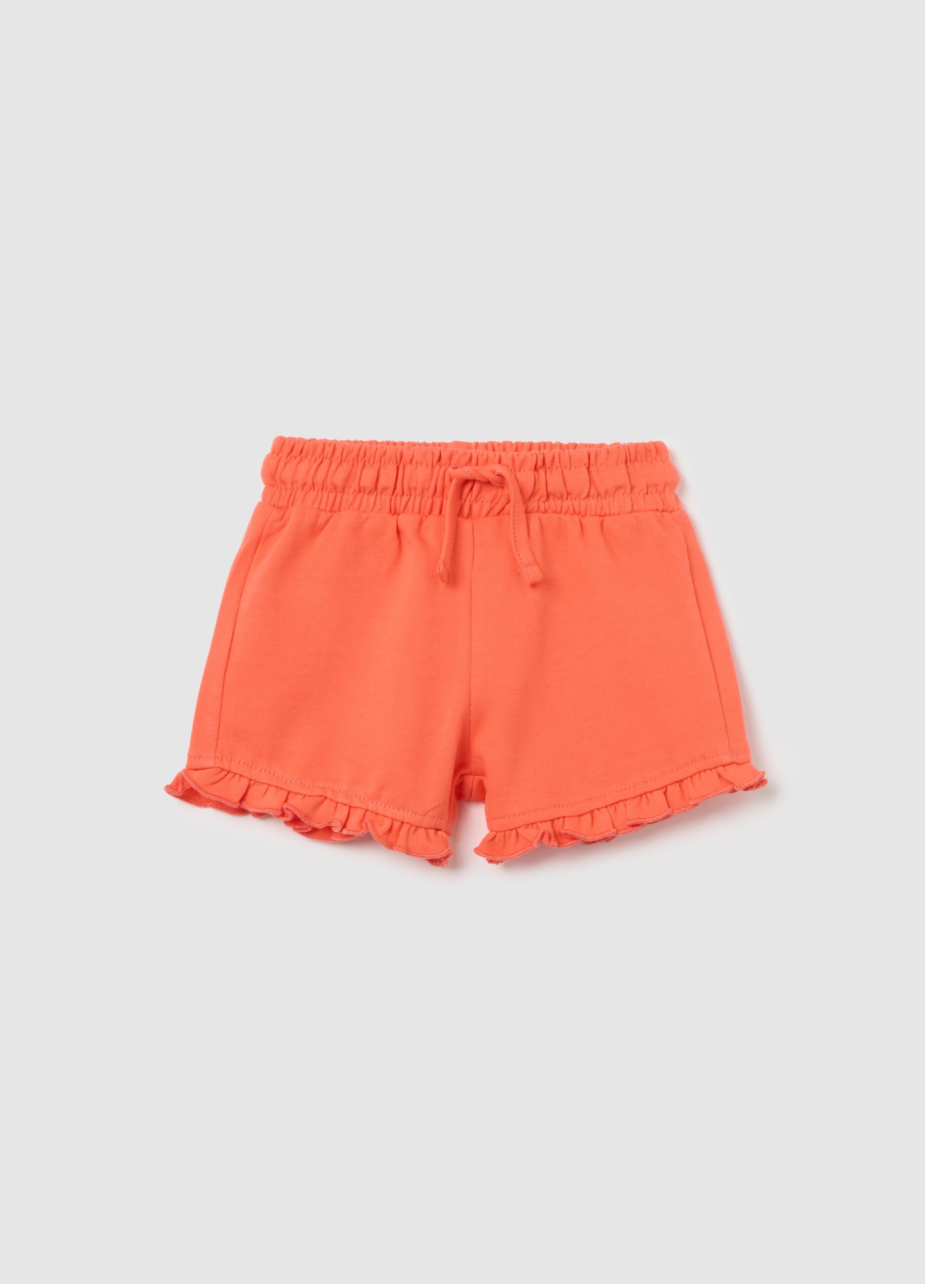 Orange shorts with cotton frills