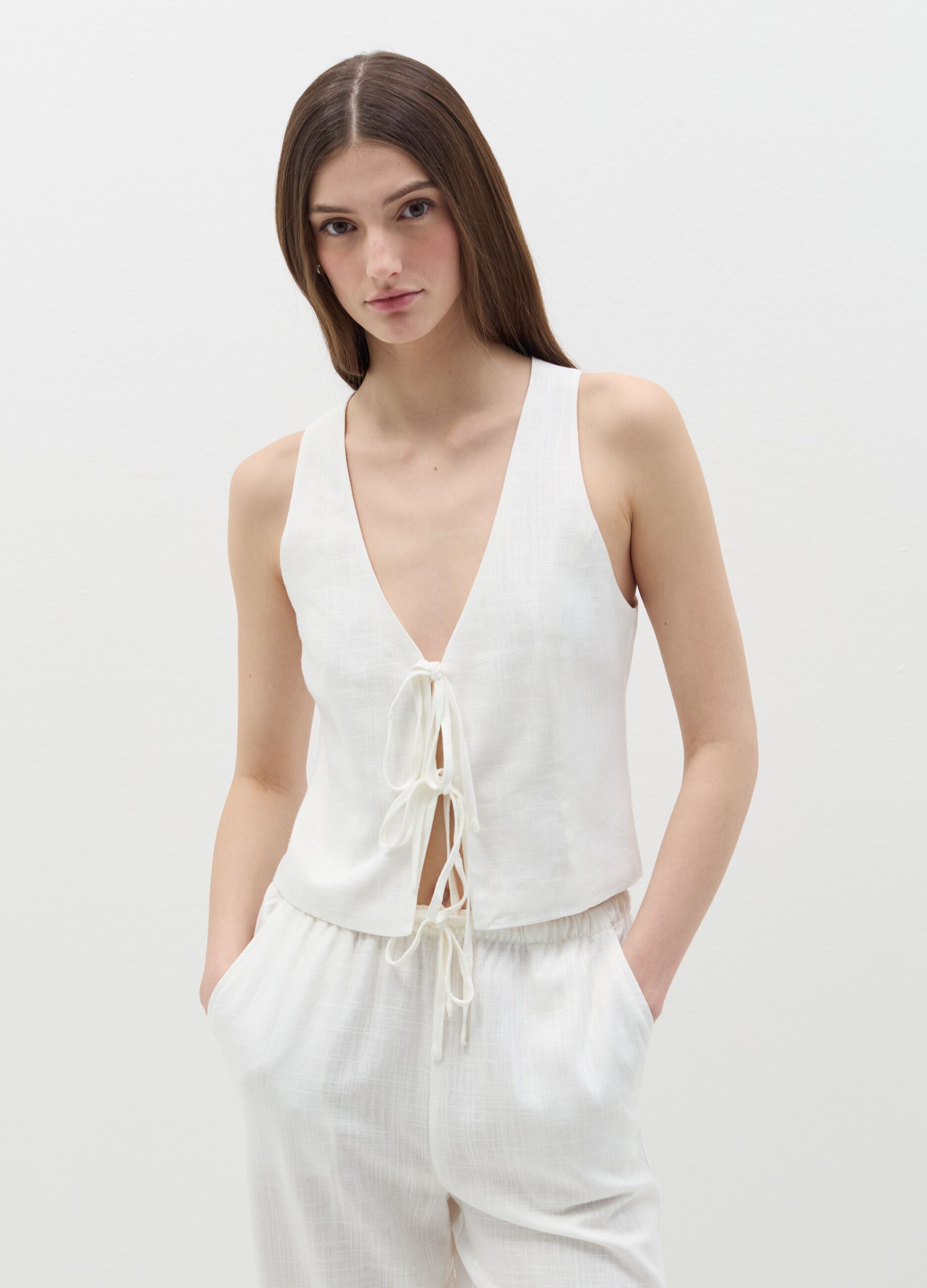 White linen gilet with laces