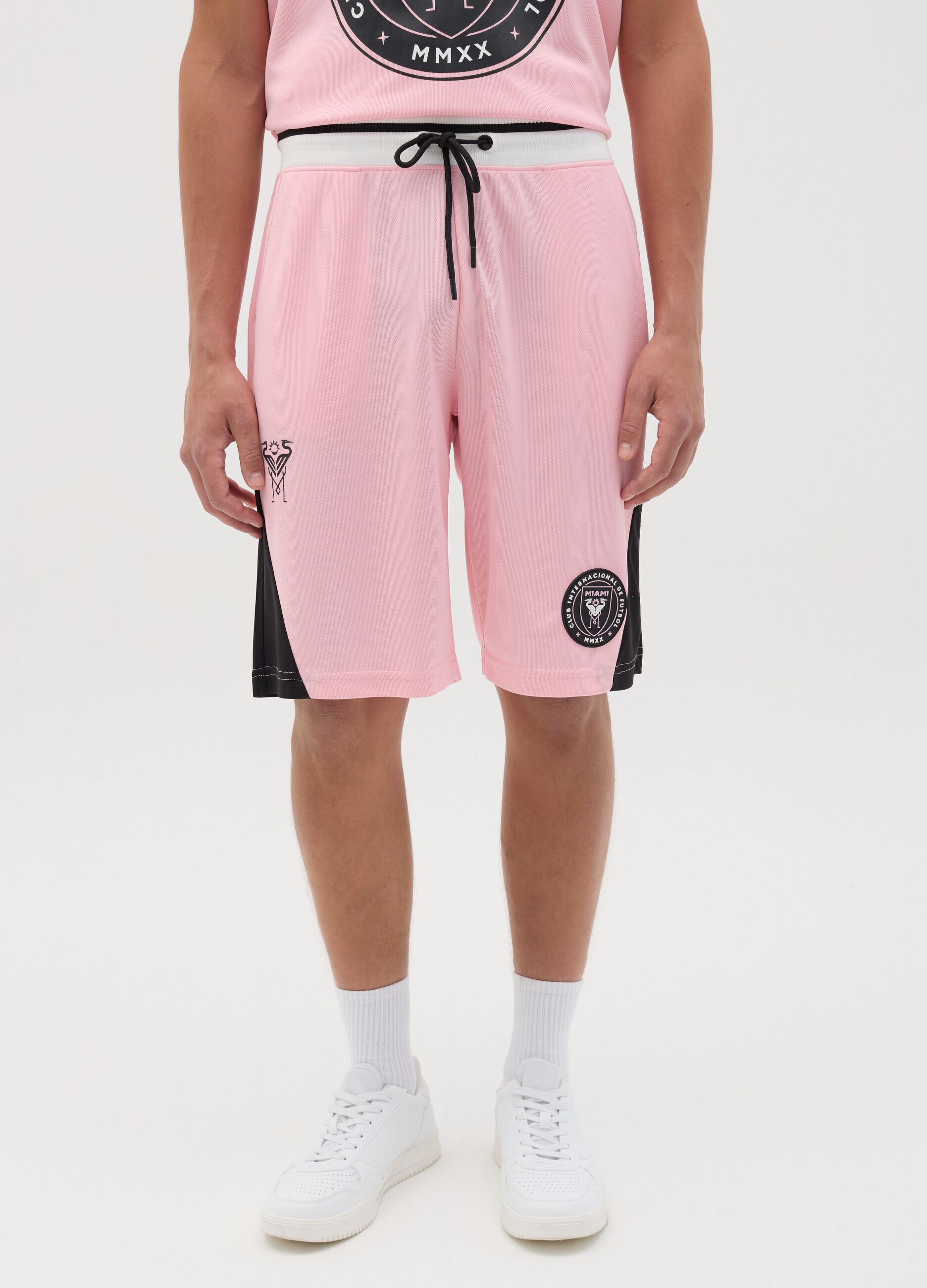 Pink Bermuda joggers with black details