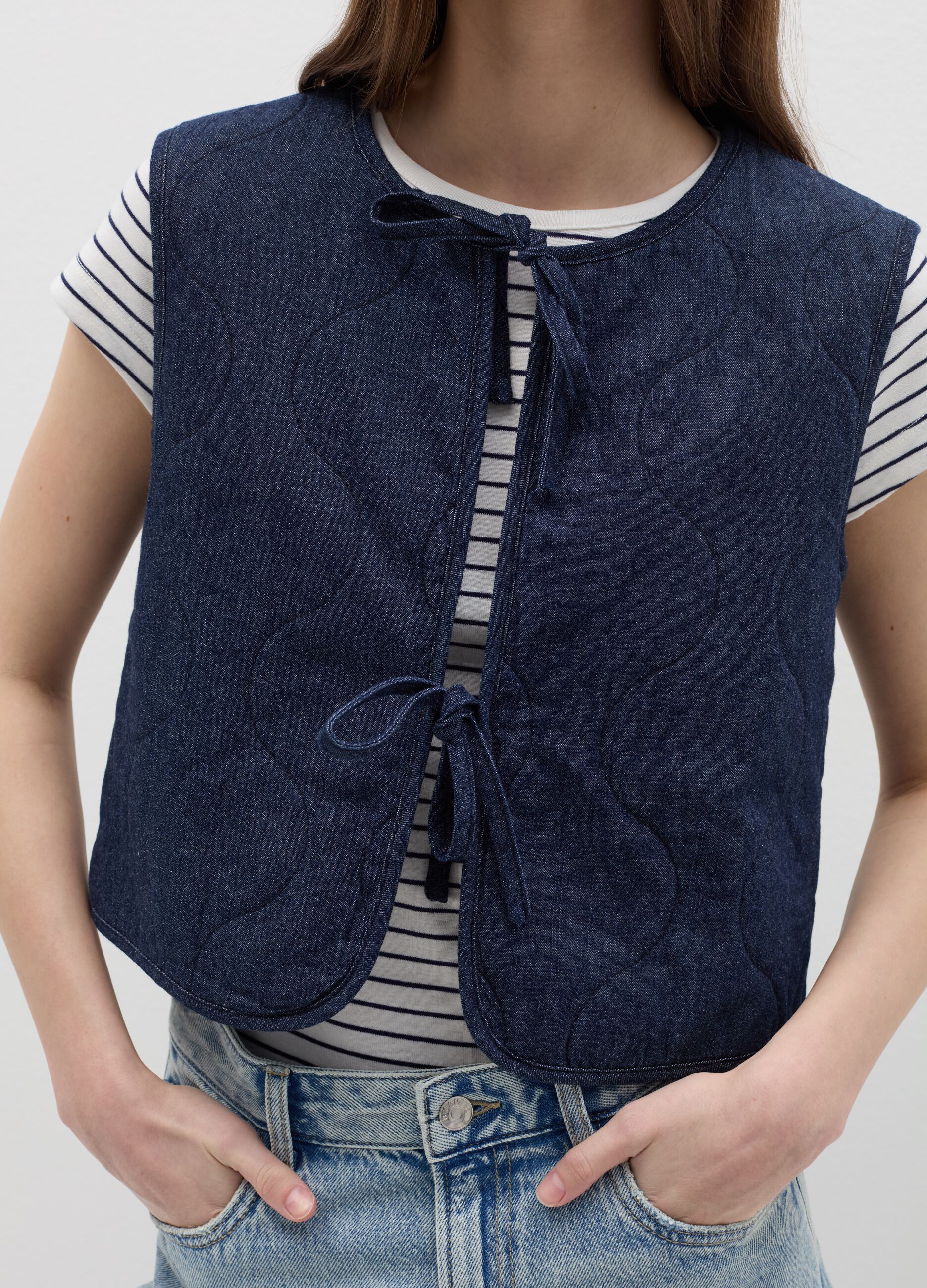 Padded gilet in denim with laces