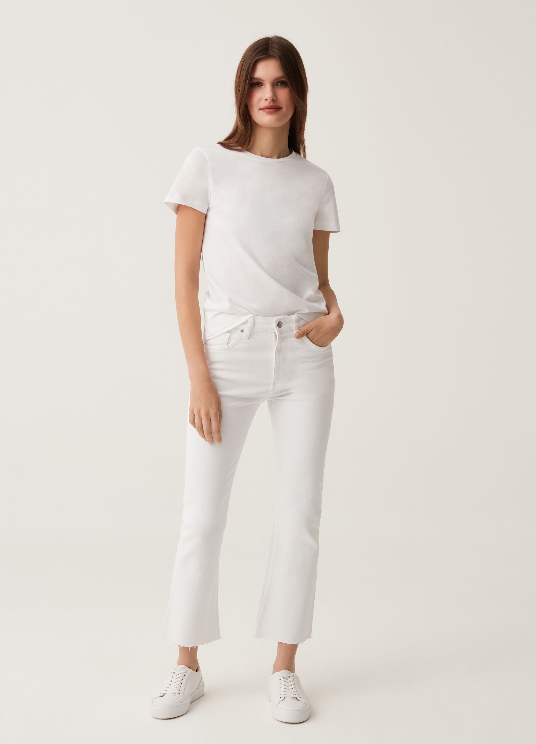 Flare-fit jeans with raw edging