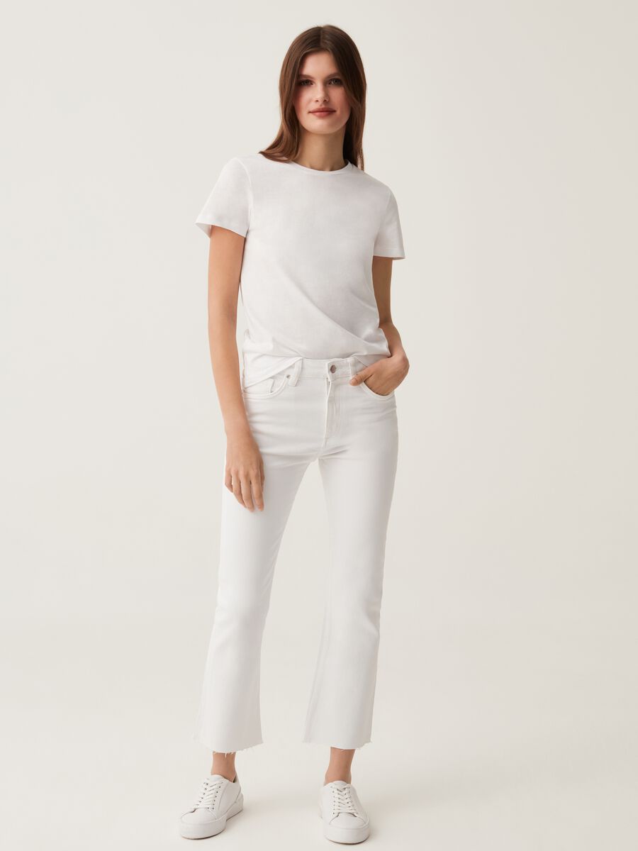 Flare-fit jeans with raw edging_0
