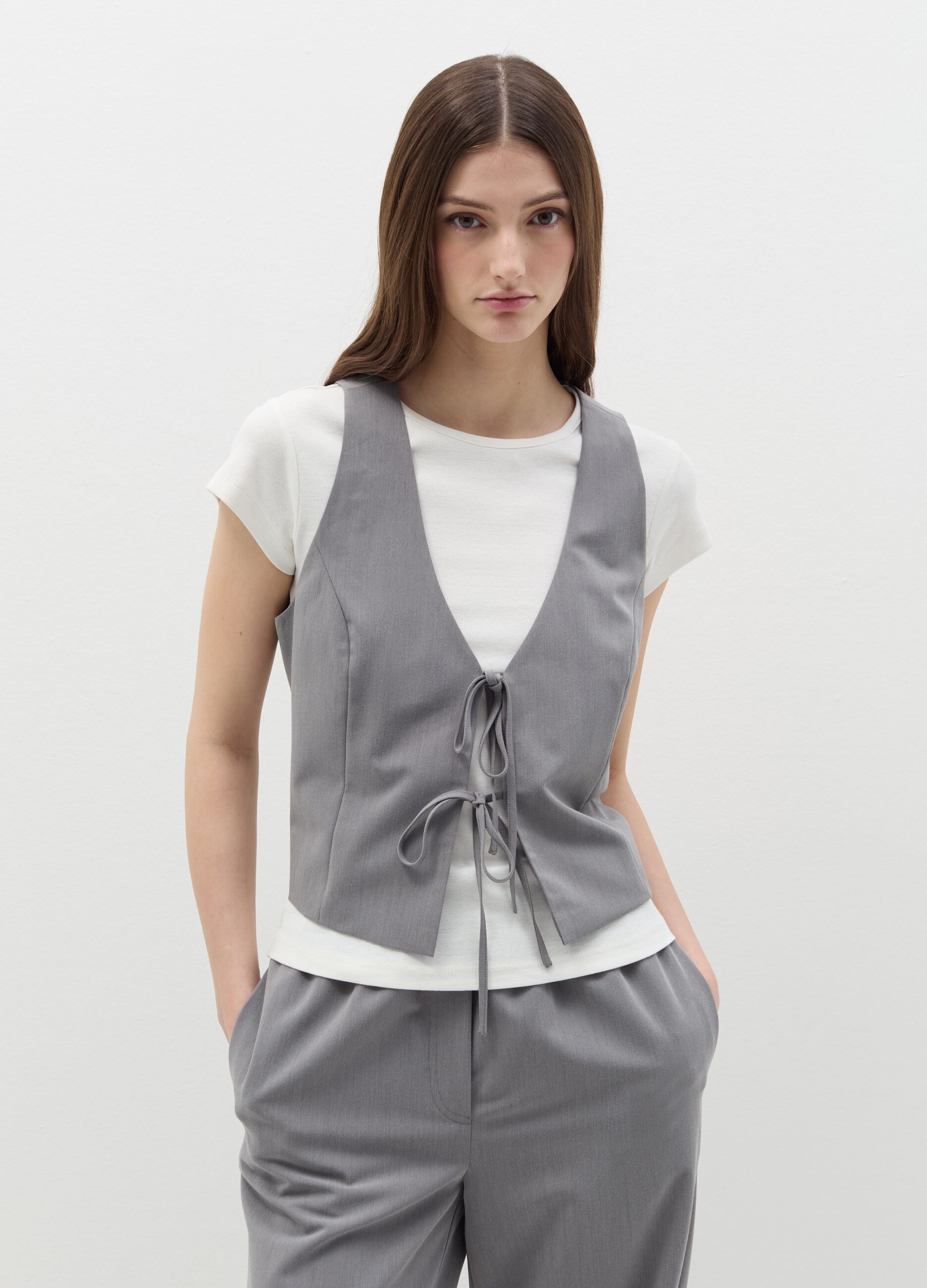 Gilet con laccetti