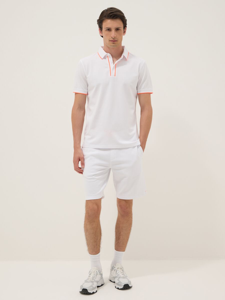 White stretch cotton polo shirt with contrast trims_1