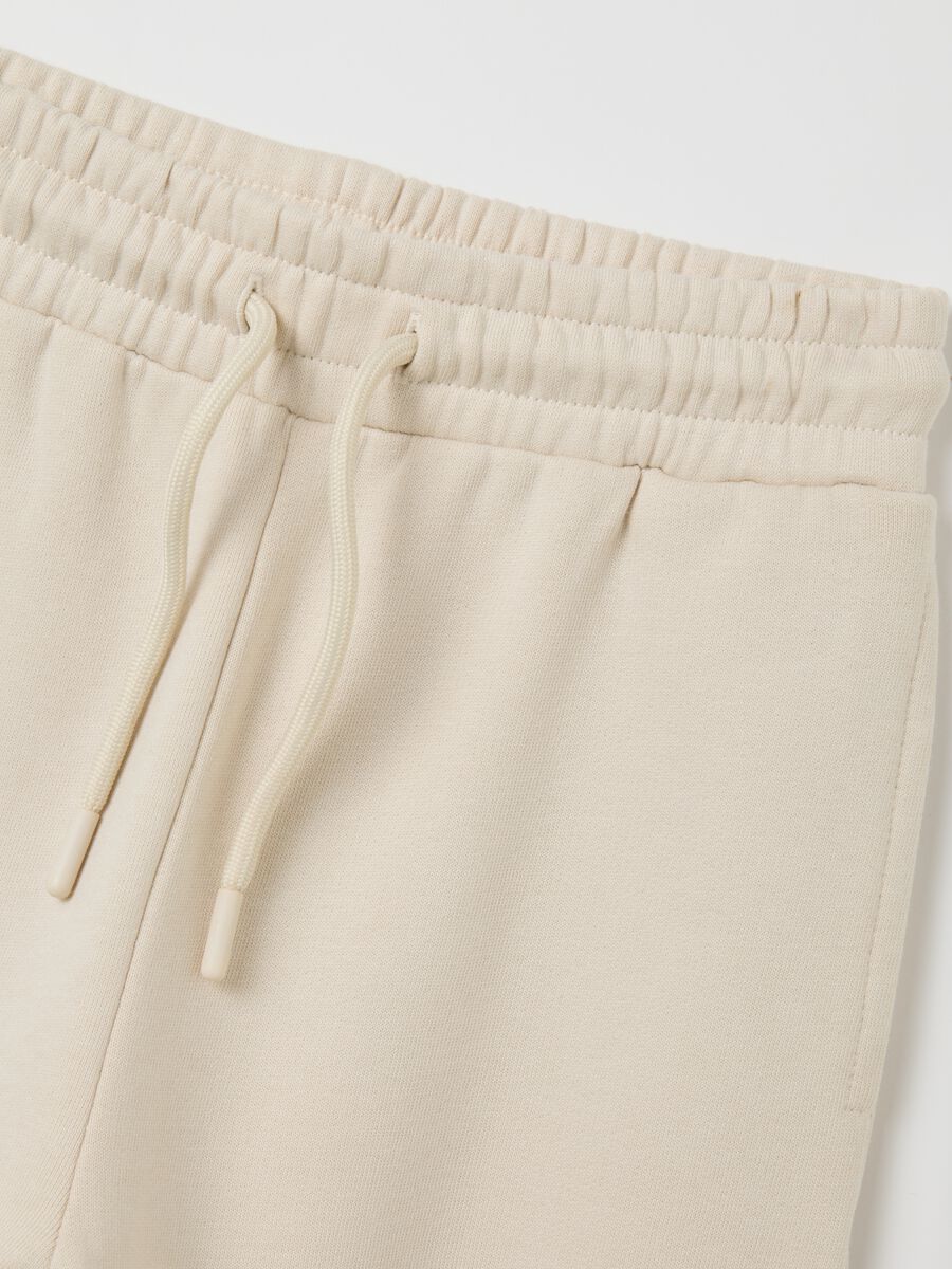 Children's beige pure cotton regular fit trousers with print_3