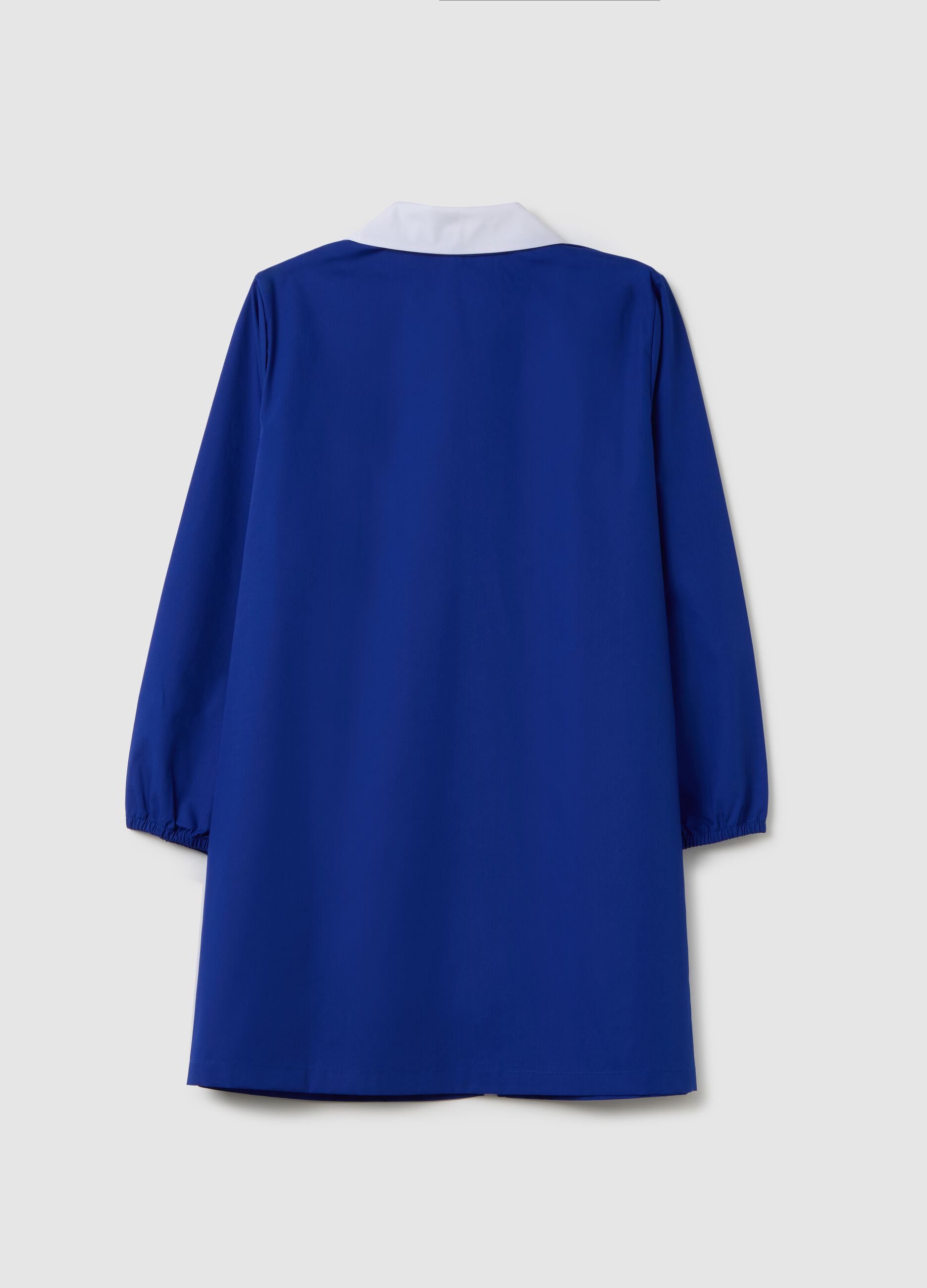 Blue cotton blend school smock for children with white collar featuring Super Mario