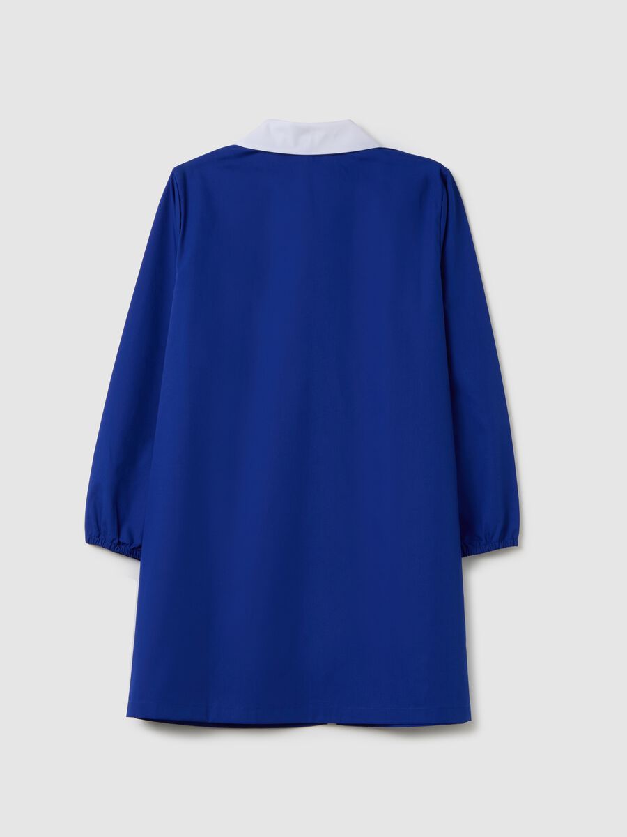 Blue cotton blend school smock for children with white collar featuring Super Mario_1