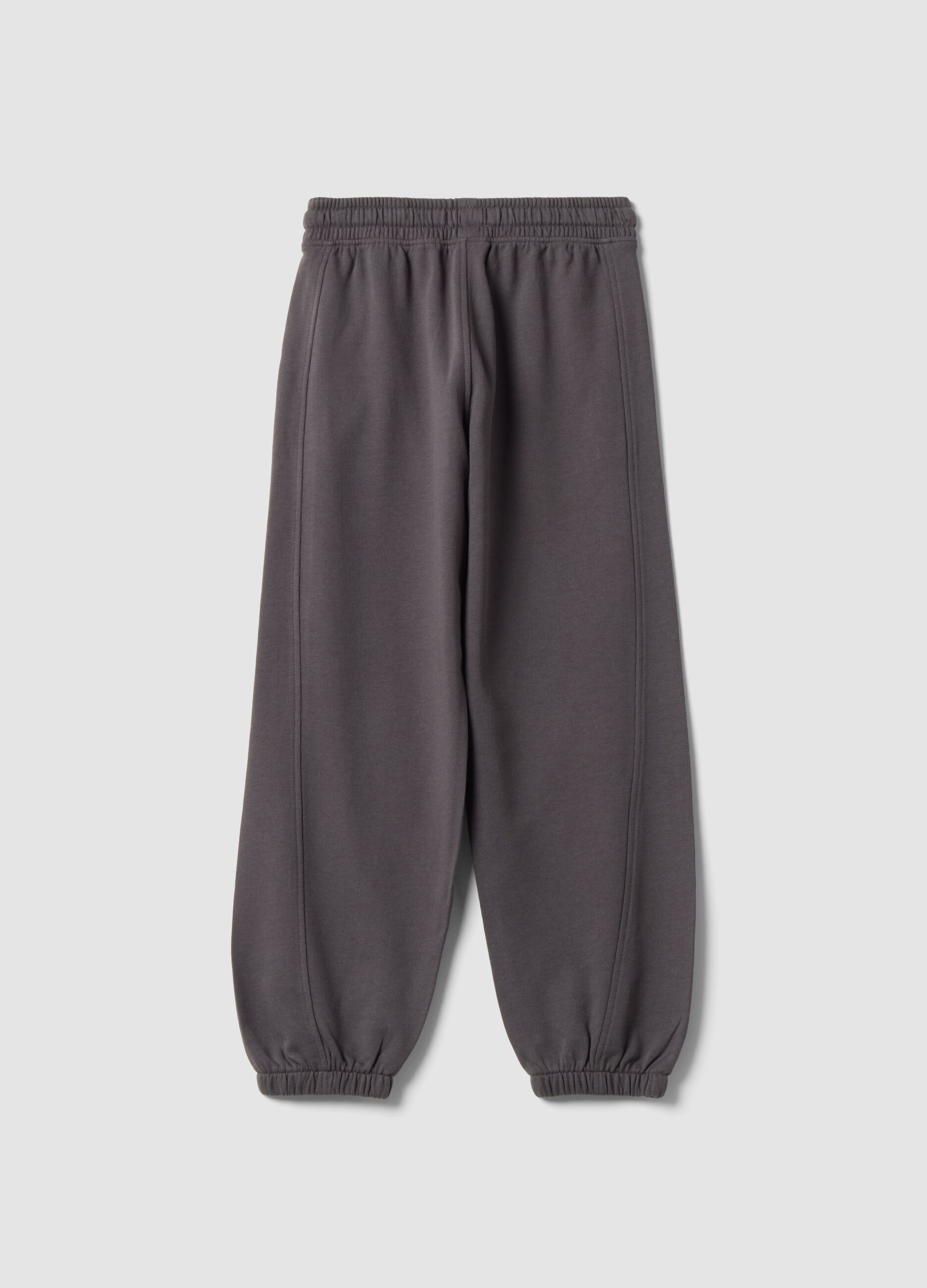 Pantaloni jogger grigi in puro cotone con fondo elastico