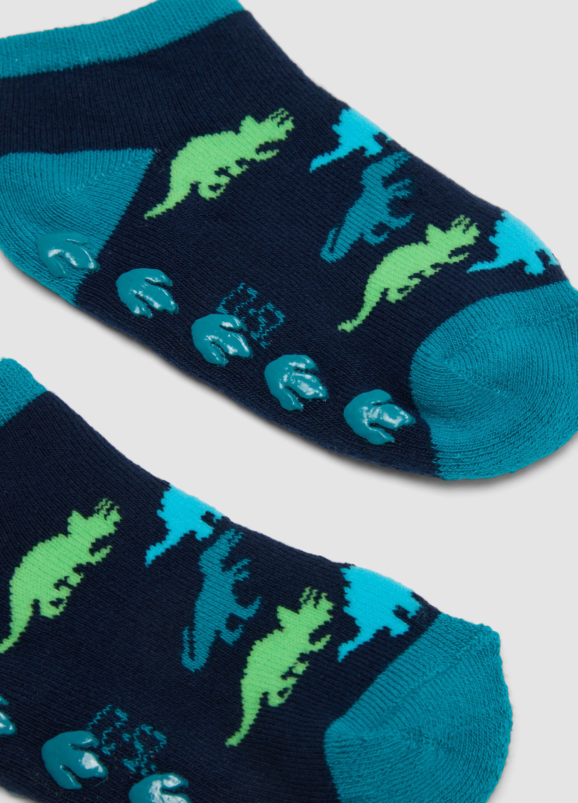 2-pack of green anti-slip socks in stretchy organic cotton with dinosaur print