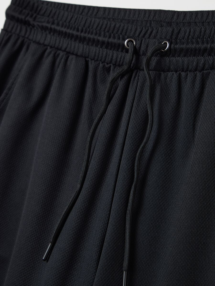 Black Bermuda joggers with NFC print_5