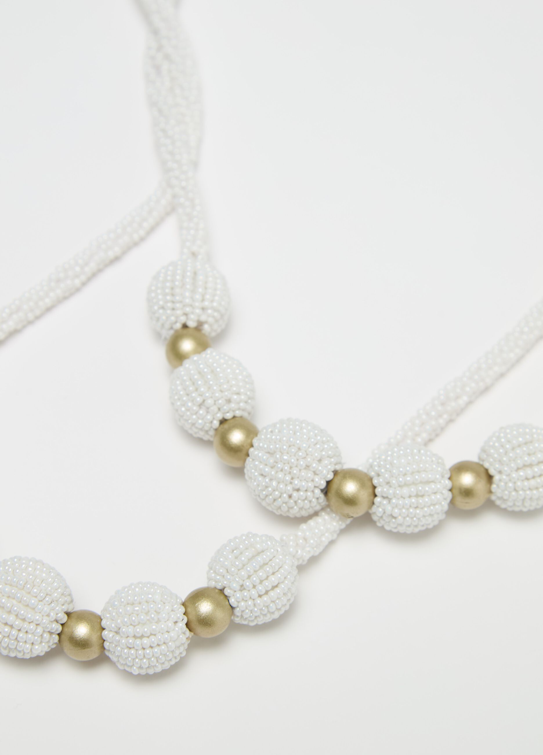 Beaded necklace with gold details