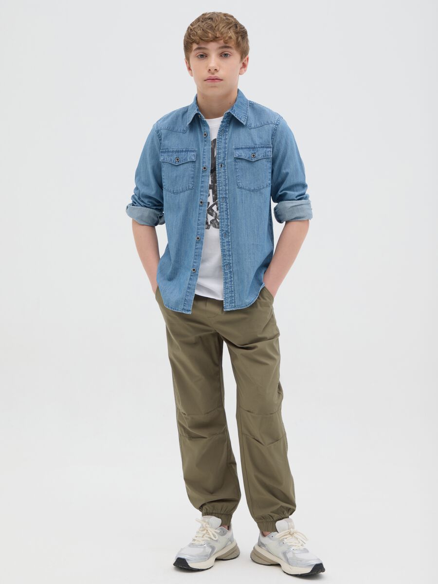 Boys’ trousers in 100% green cotton._1