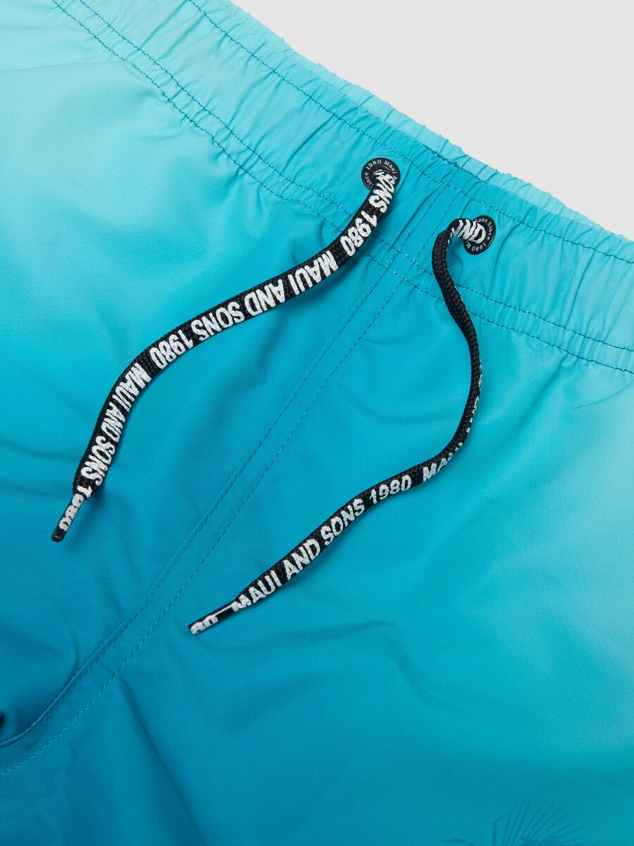 Blue tropical-print swim shorts_2
