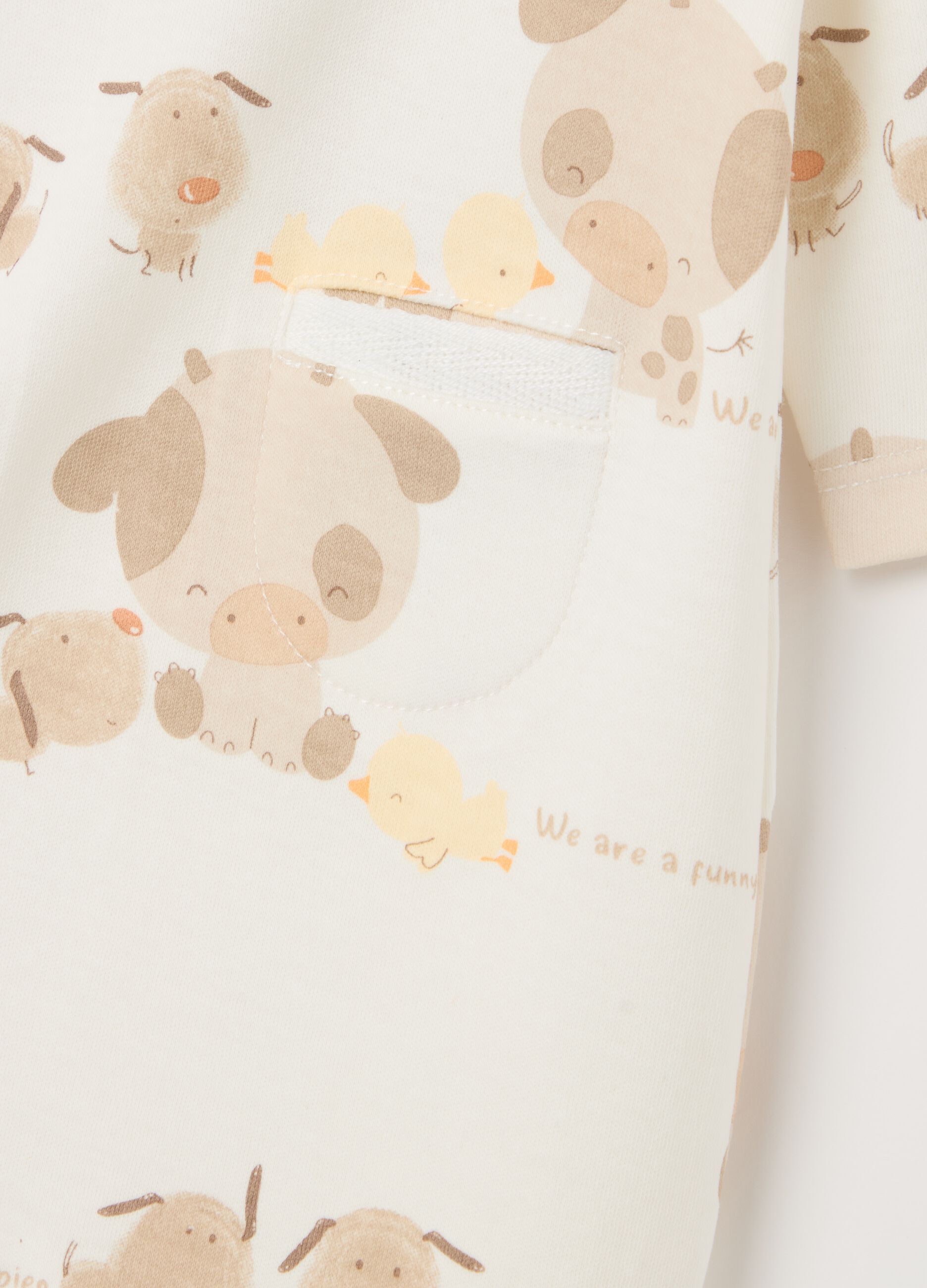Cotton onesie with feet and "We are a funny family" embroidery