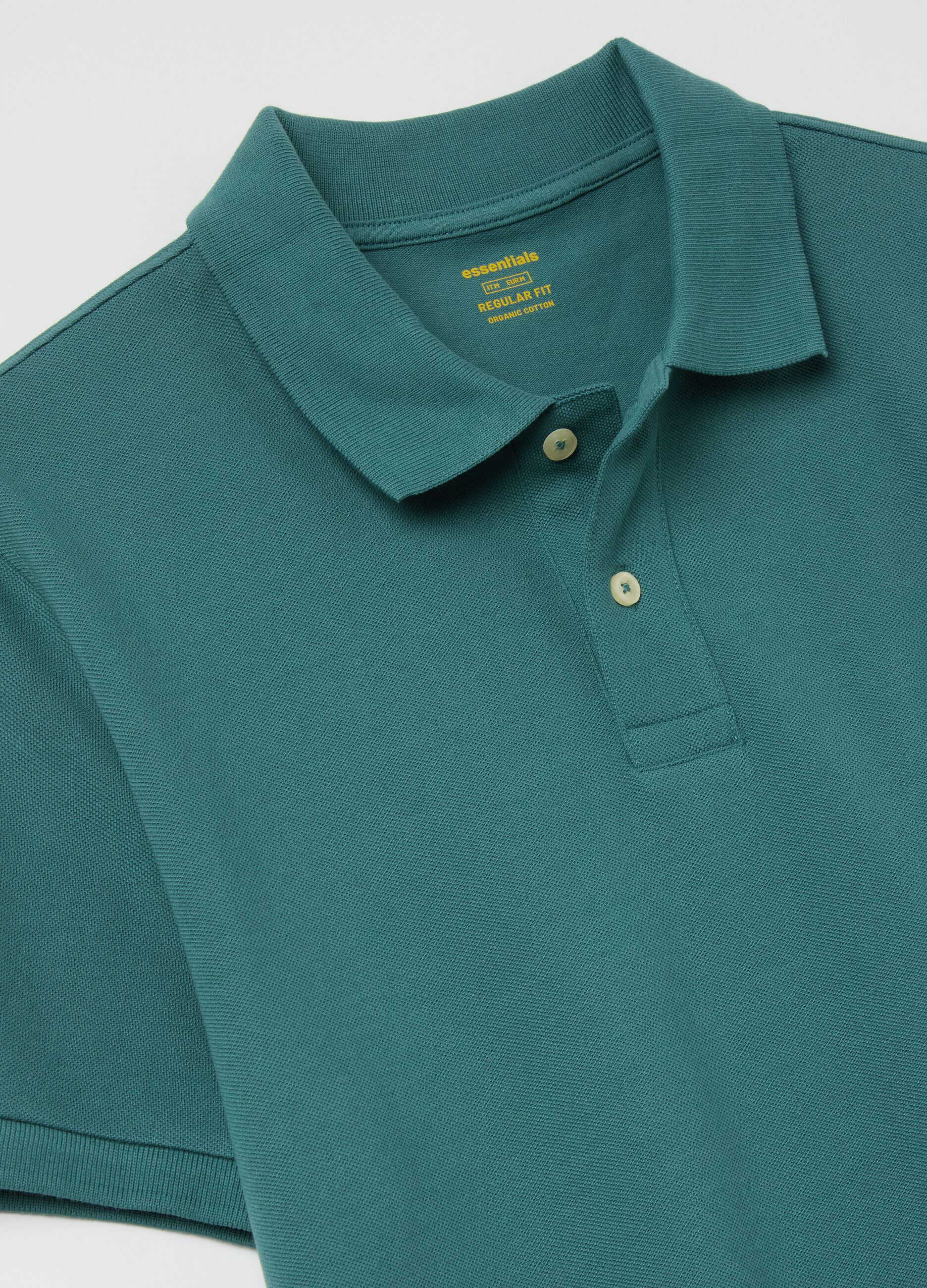 Solid colour polo shirt in organic cotton