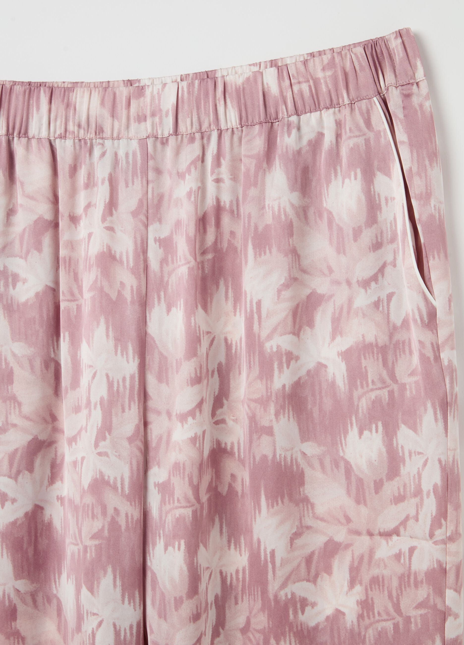 Pantalone pigiama in satin rosa e bianco