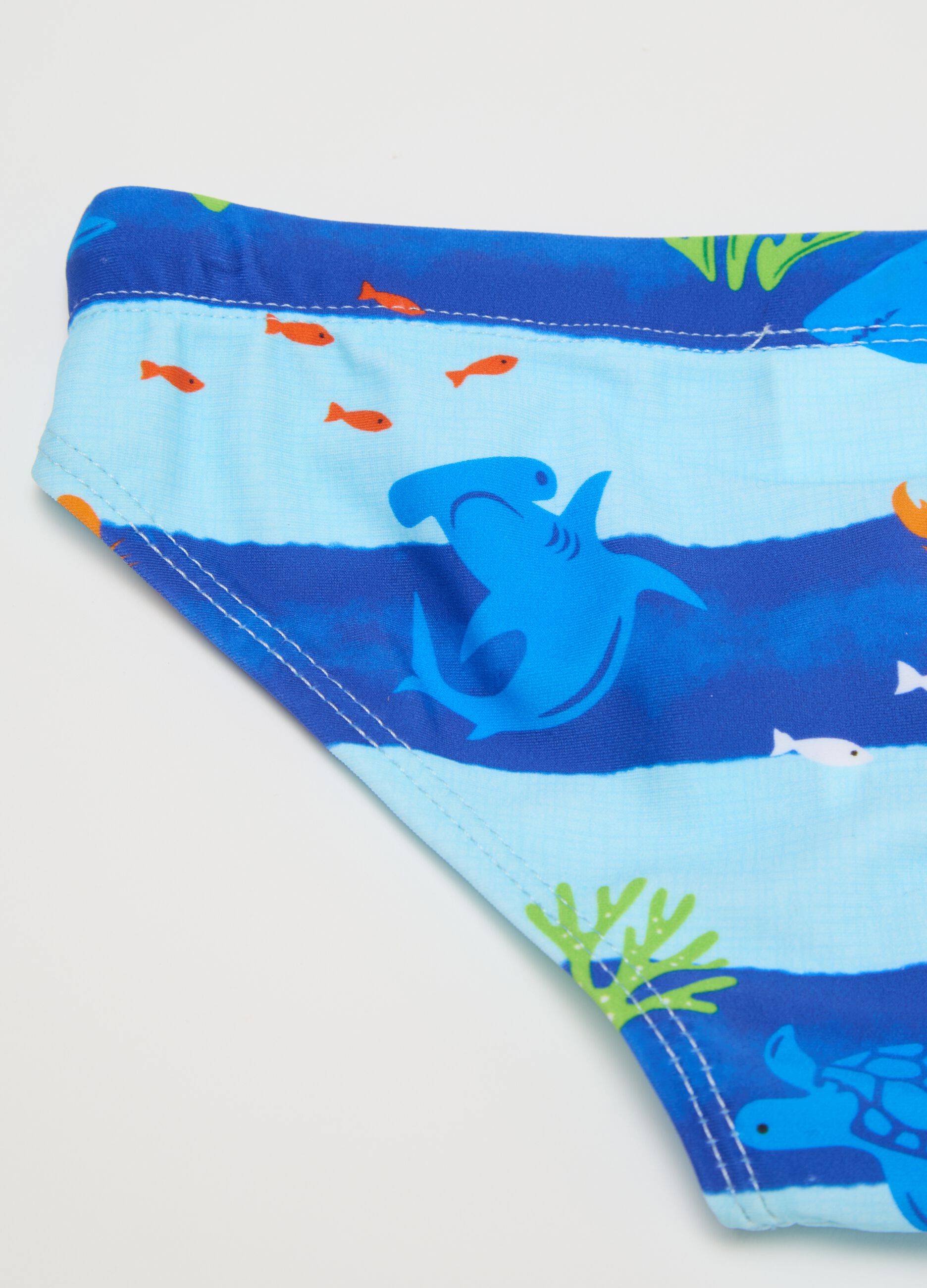 Blue kids' briefs with ocean pattern