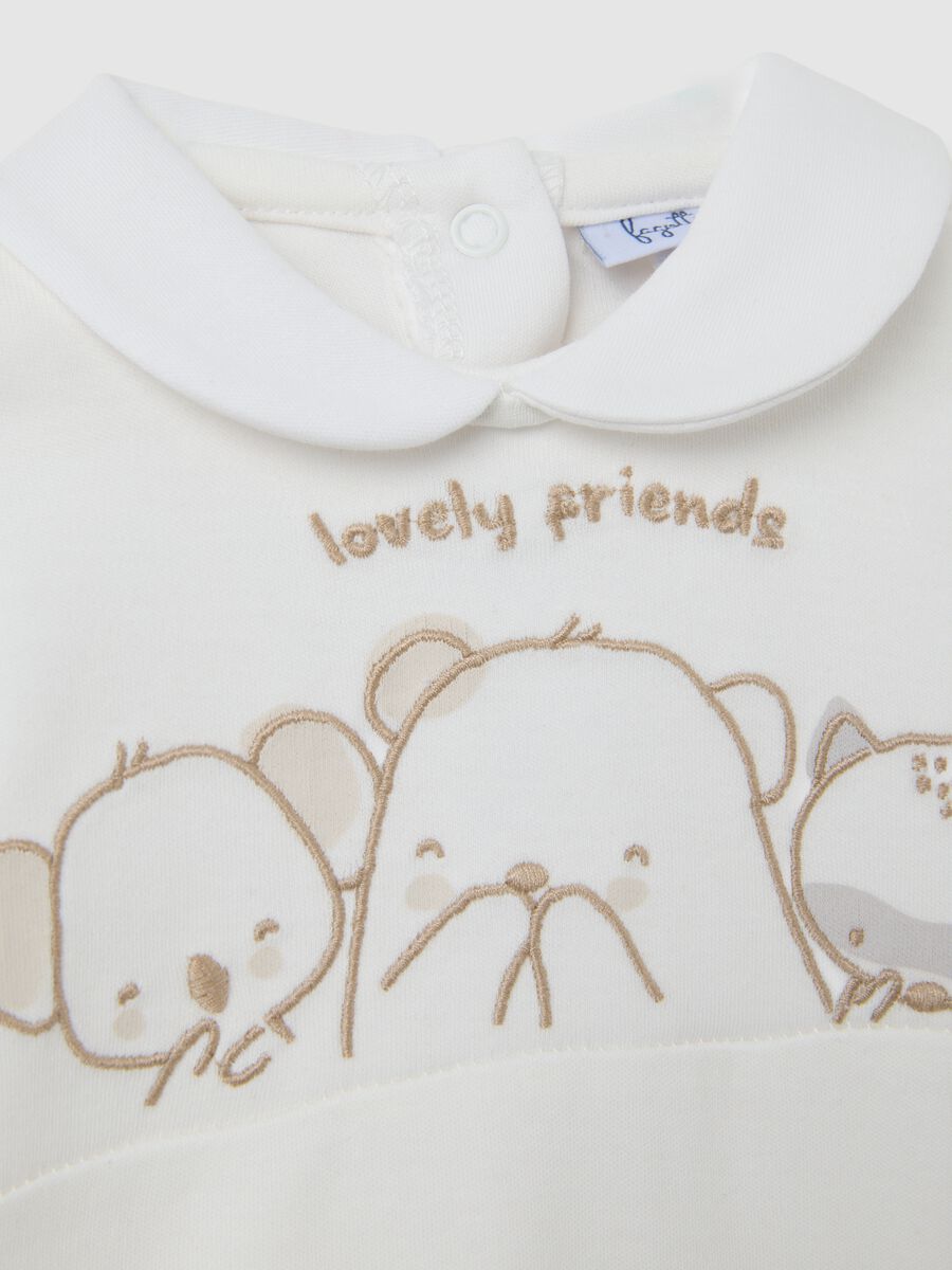 White baby romper in pure cotton with embroidery_2
