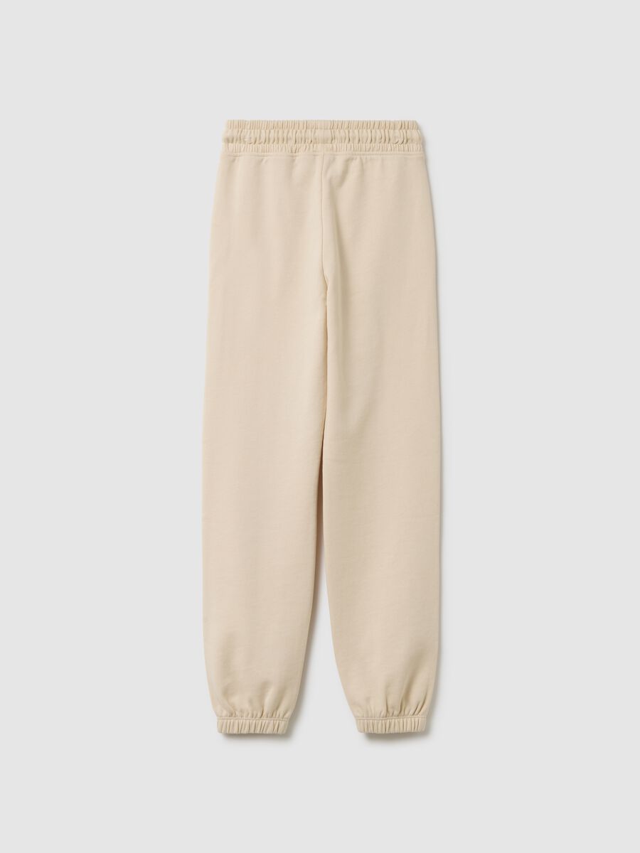 Girls' beige regular fit jogging trousers in pure cotton_1