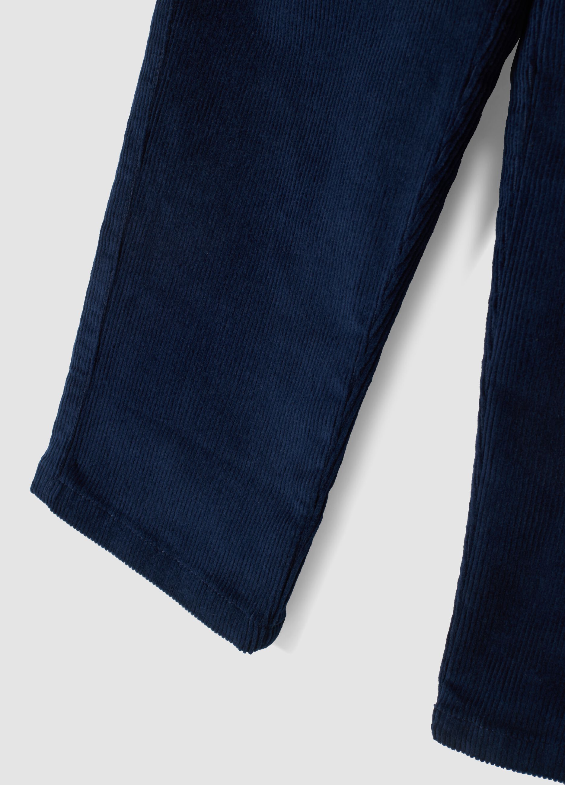 Pantaloni blu scuro in cotone elasticizzato a coste