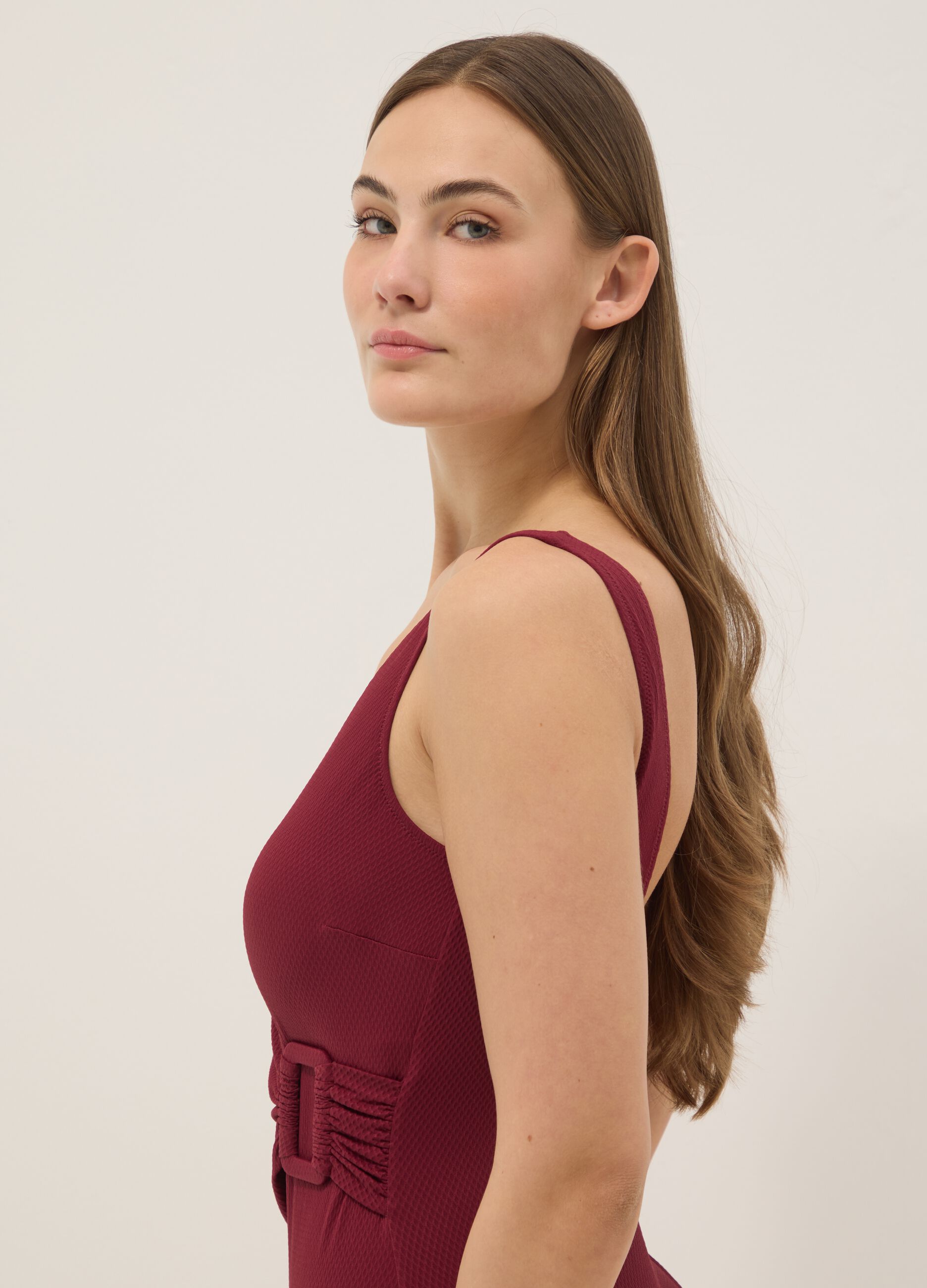 Red stretch swimsuit with side buckle