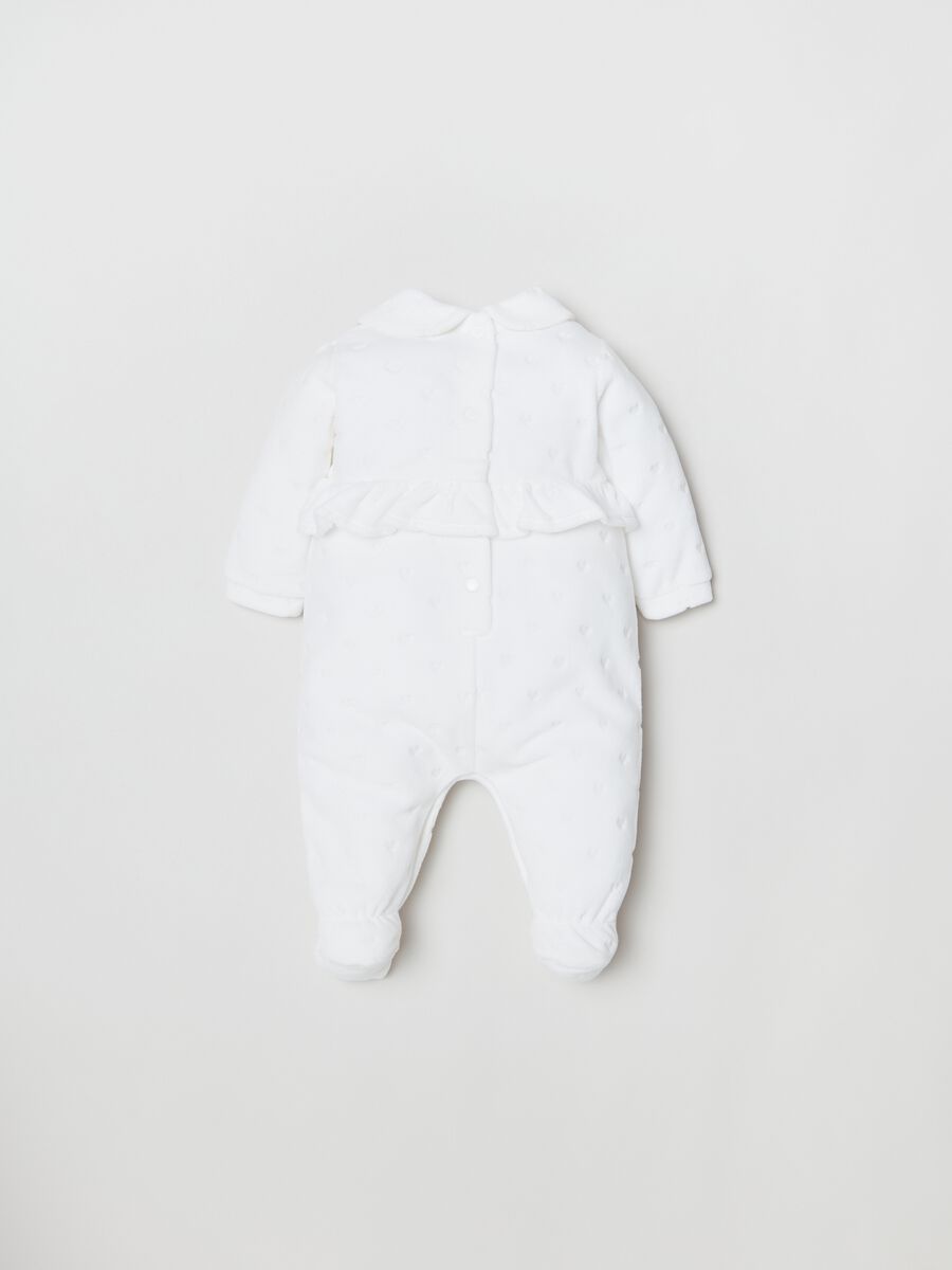 Tutina in velour con piedini trama cuori_1