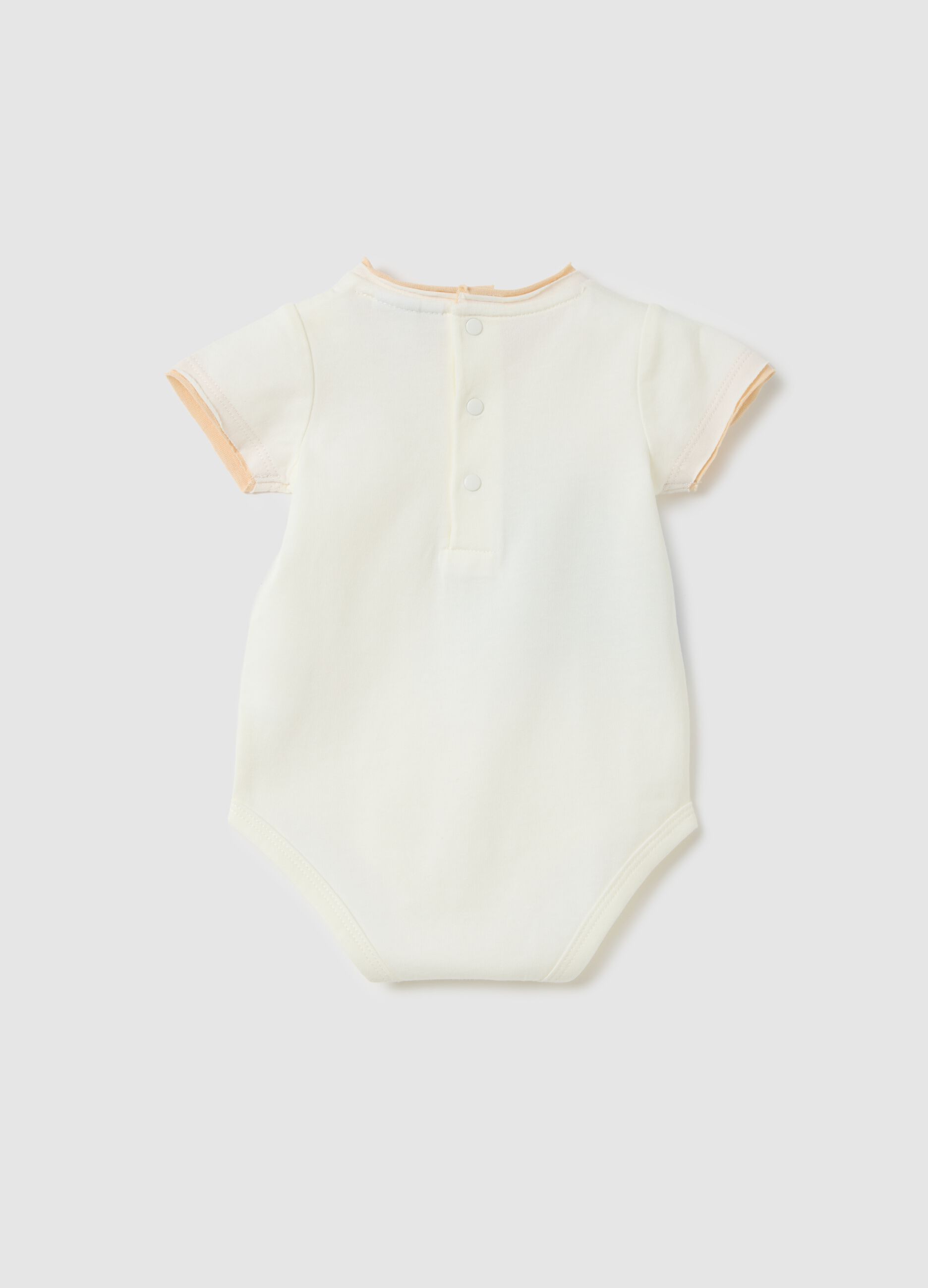 Baby bodysuit in pure white cotton with print