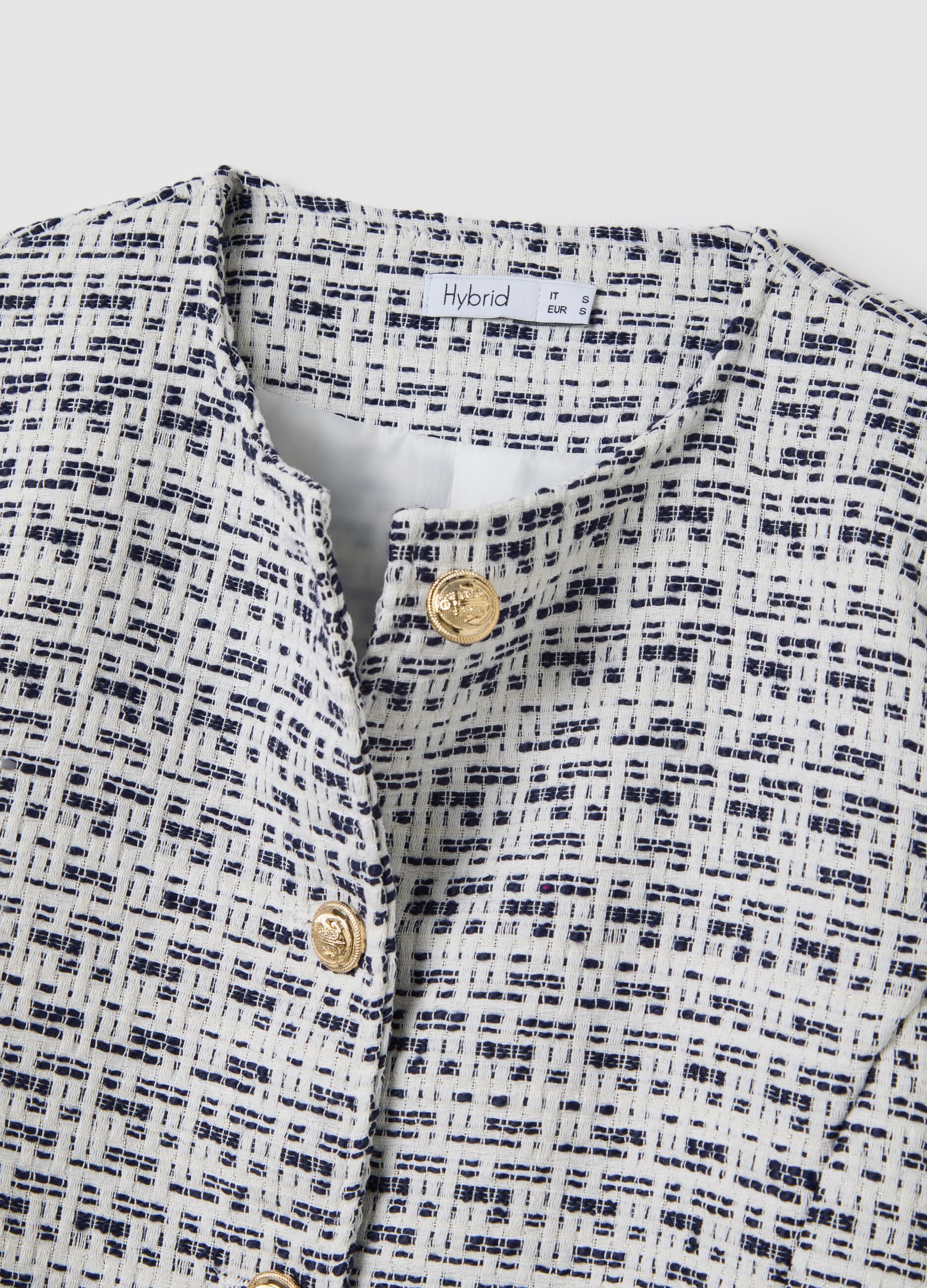 Short black and white jacket in tweed