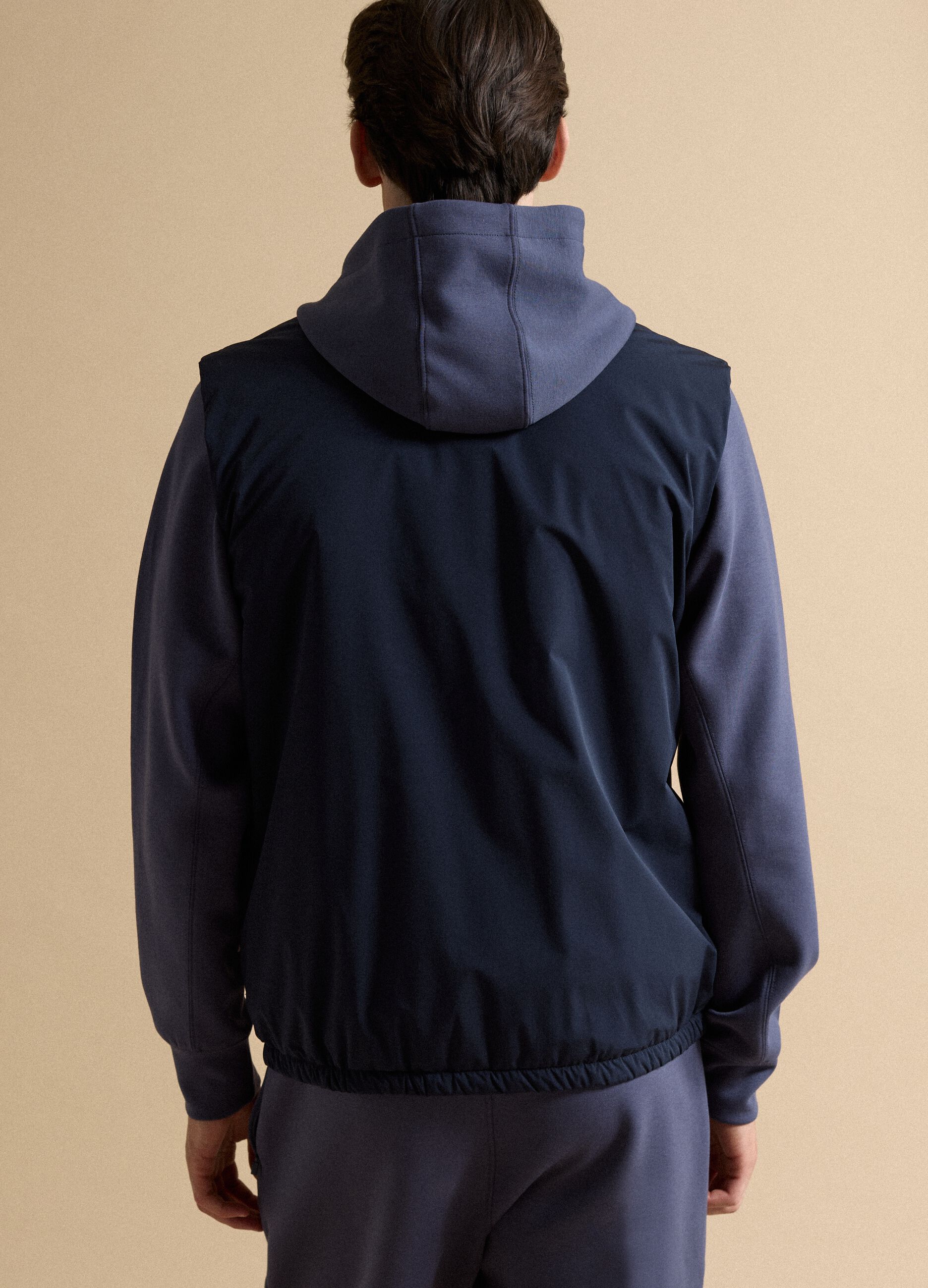 Blue stretch-fabric gilet with zip