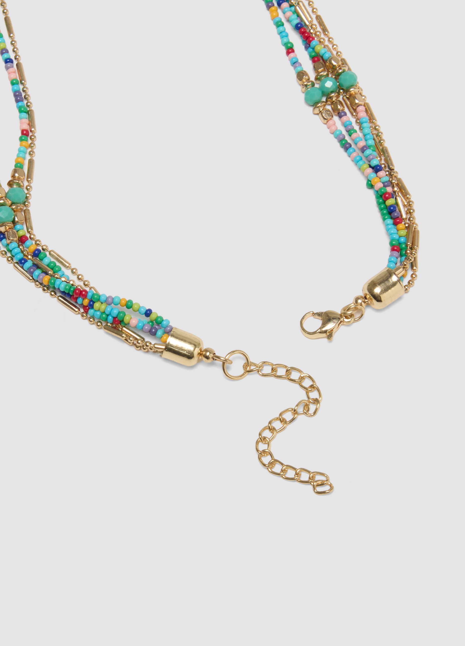 Multicolour necklace with light-blue tassels