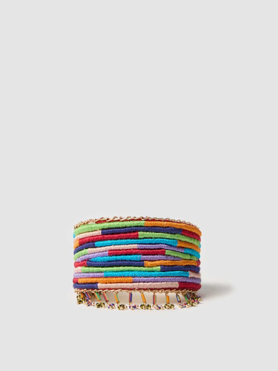 Solid bracelet with multicoloured strands and beads_0