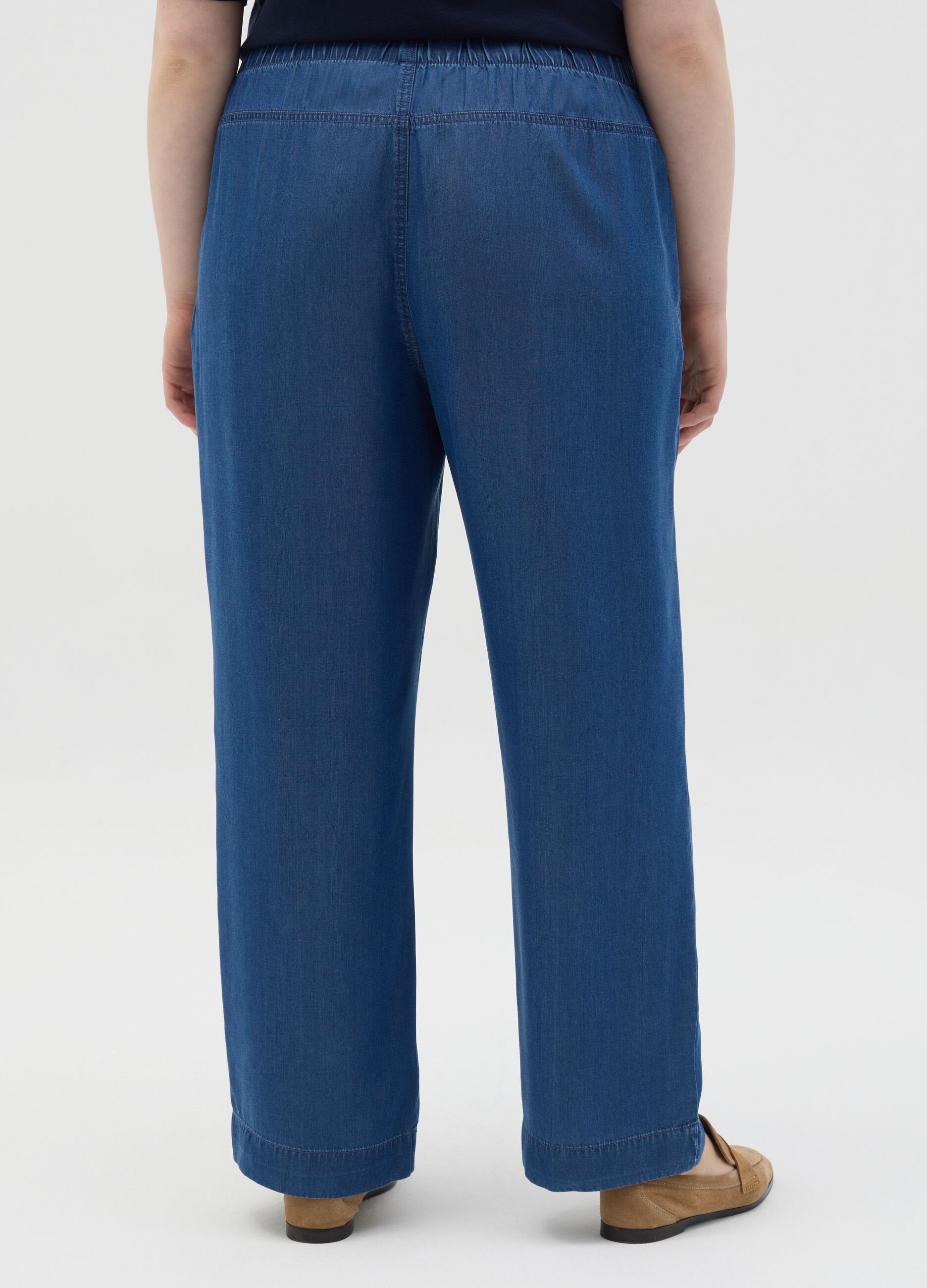 Curvy blue jogger trousers with denim effect