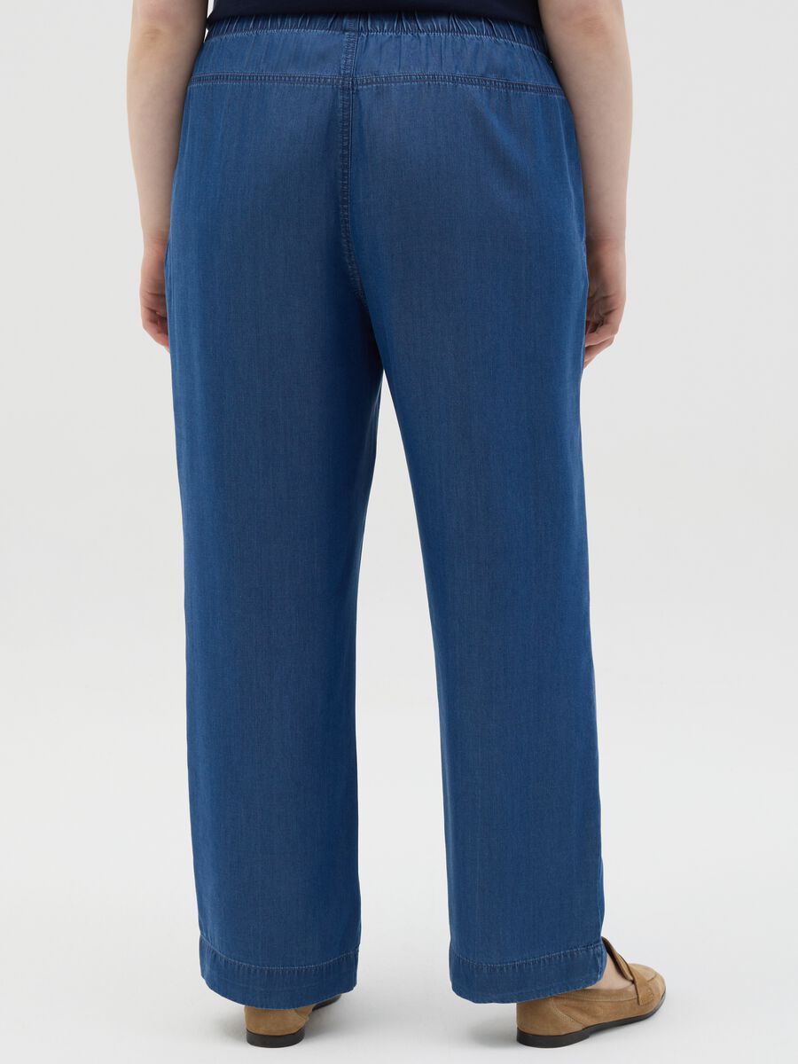 Curvy blue jogger trousers with denim effect_2