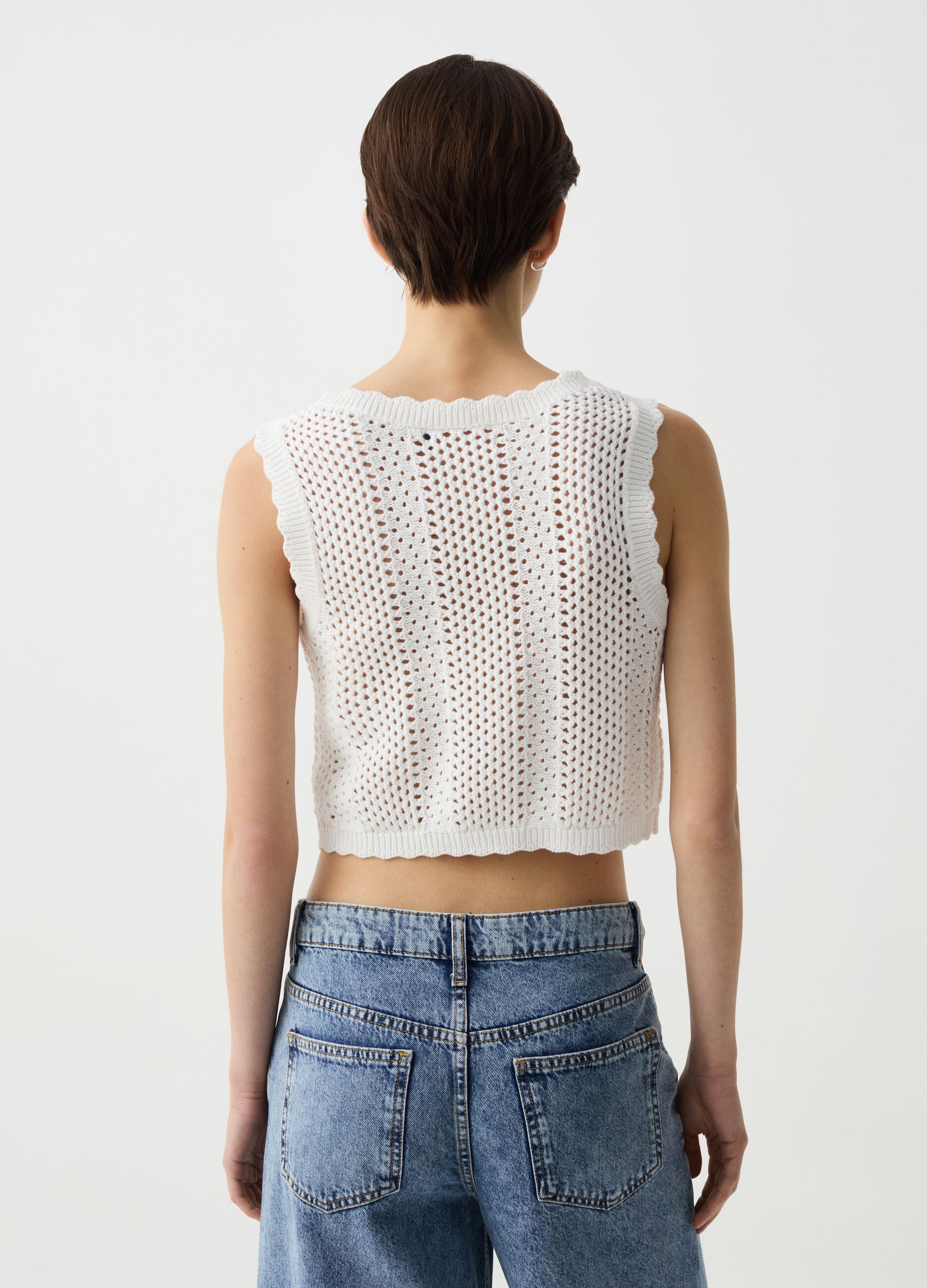 Cropped openwork gilet with wavy edges