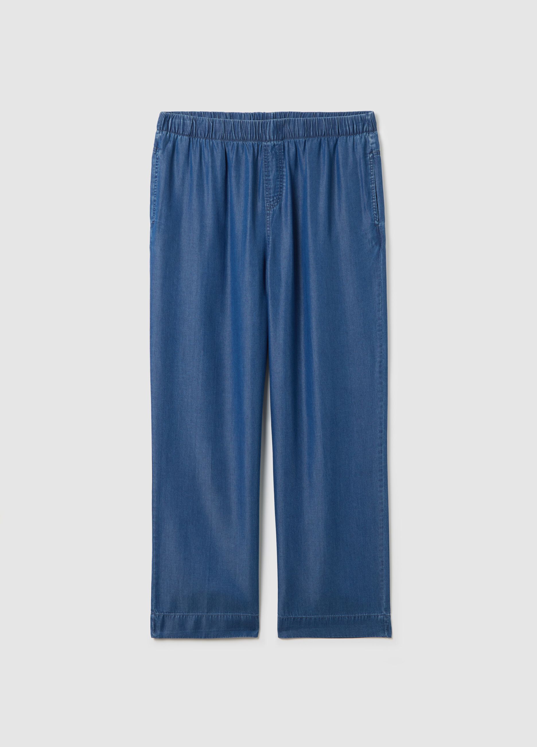 Curvy blue jogger trousers with denim effect