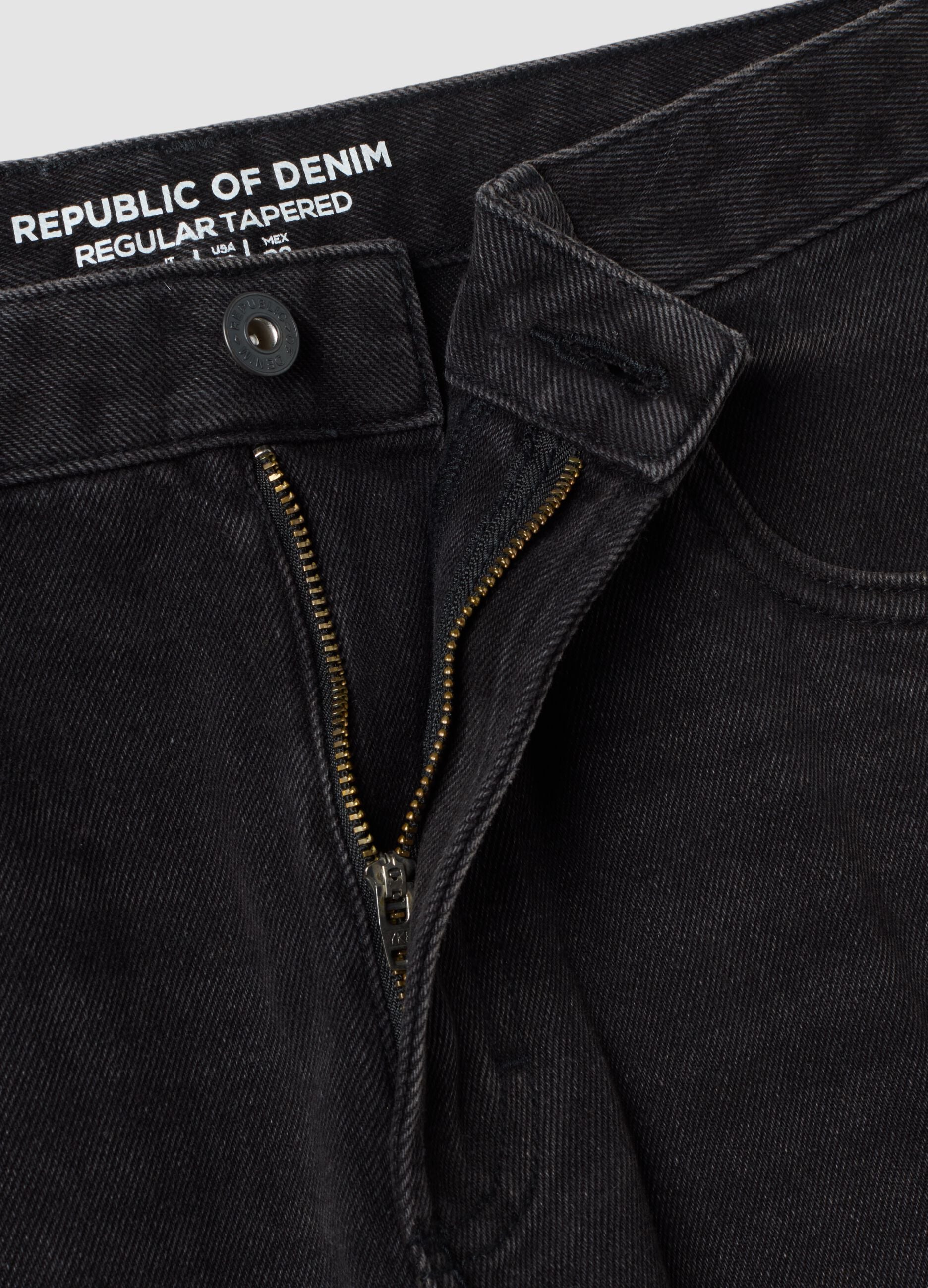 Black regular tapered jeans in a cotton, lyocell and viscose blend