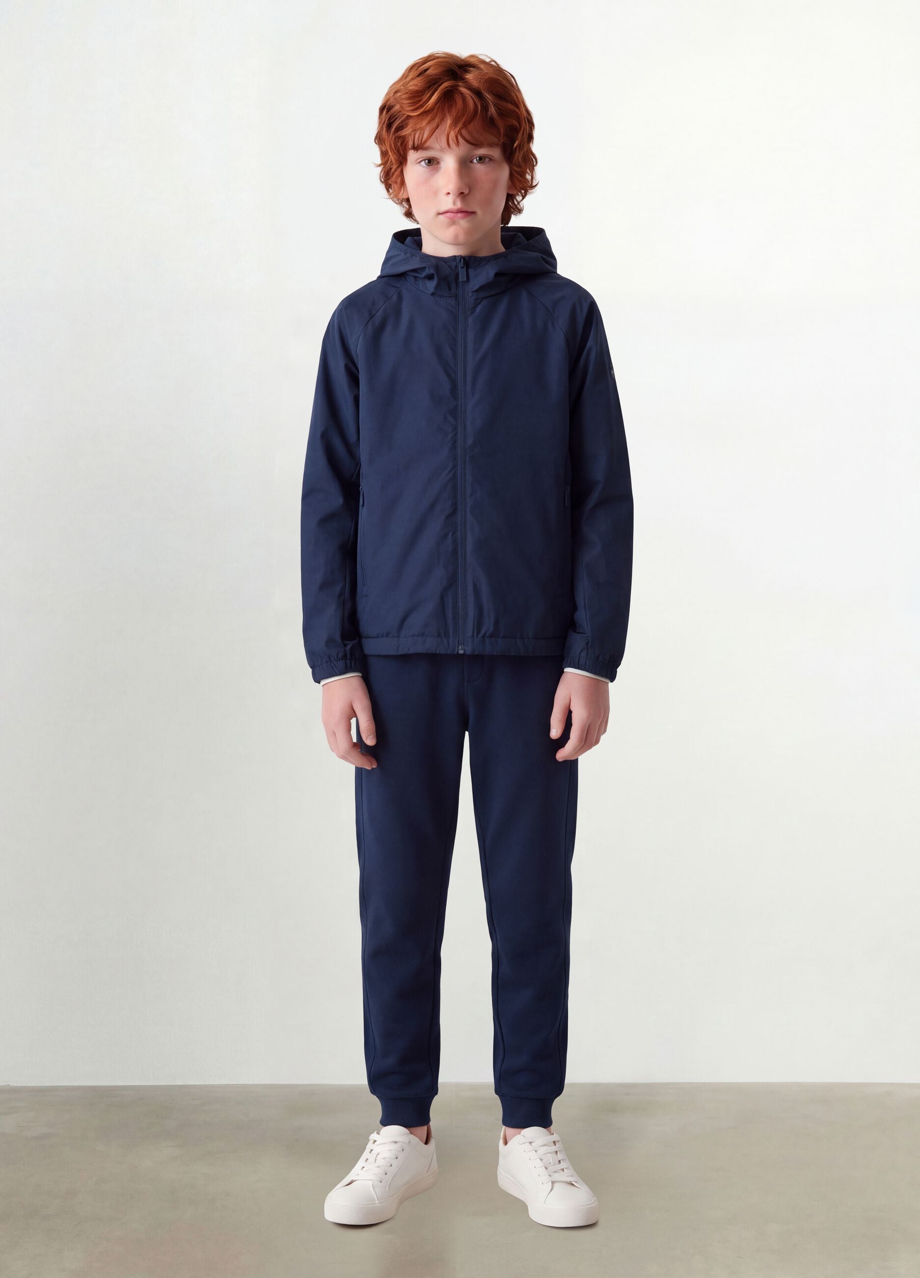 Blue boys&rsquo; rain jacket with hood and zip
