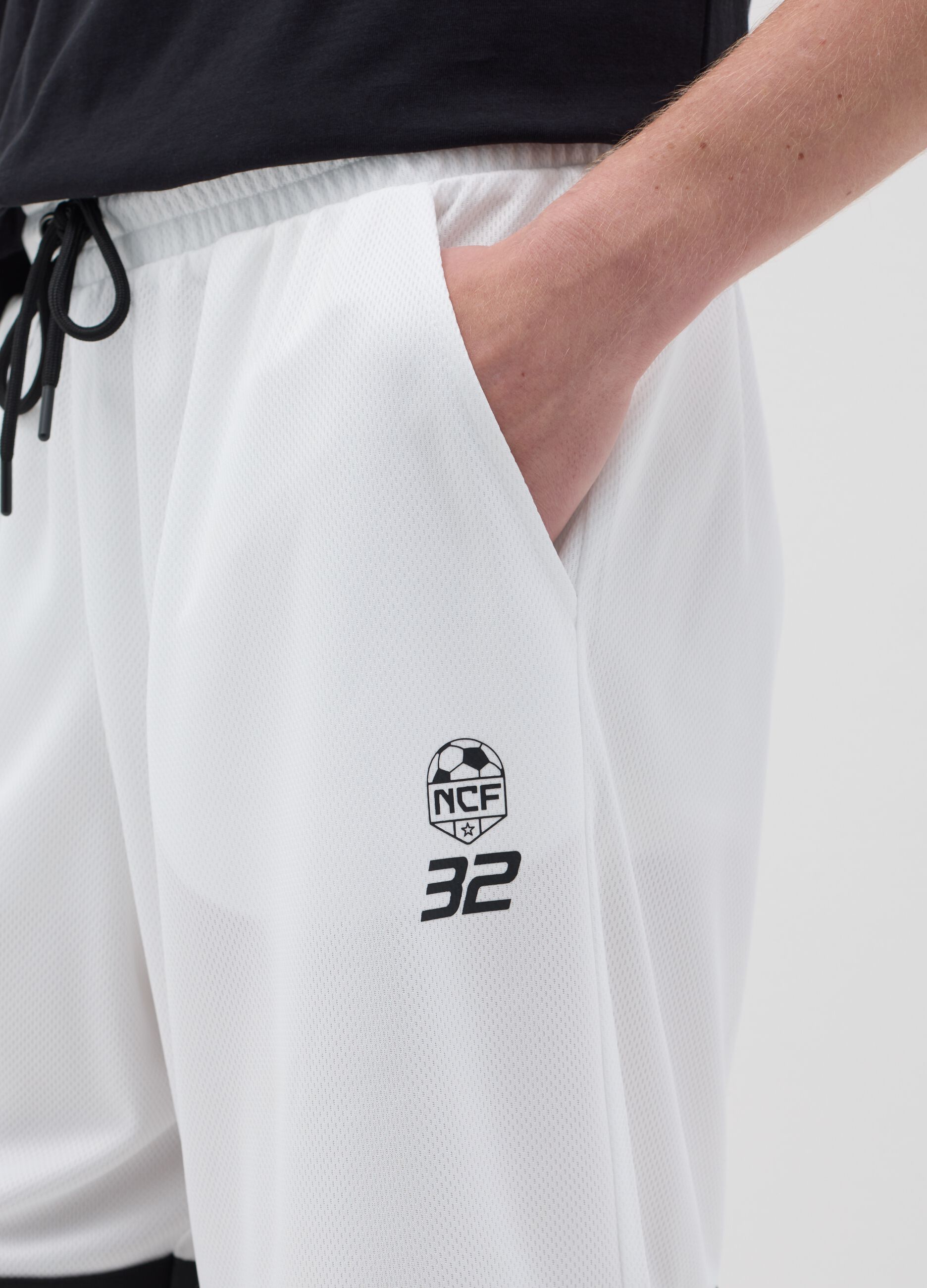 White Bermuda joggers with NFC print