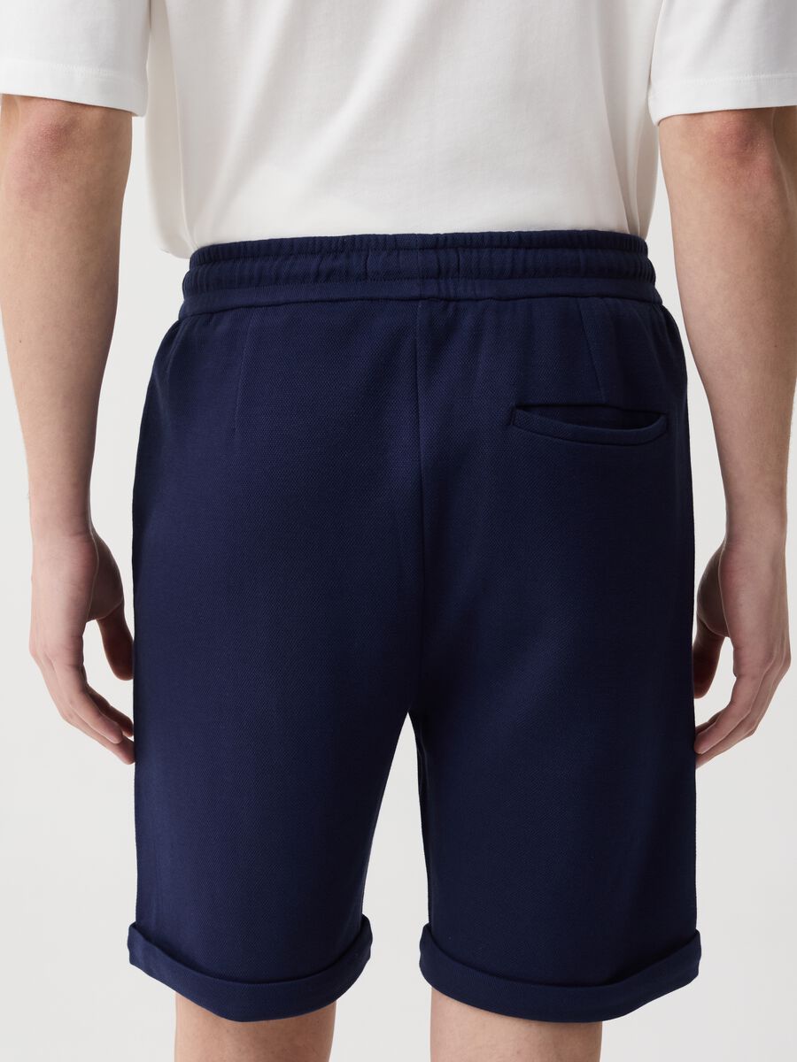 Bermuda joggers with darts and folds_1