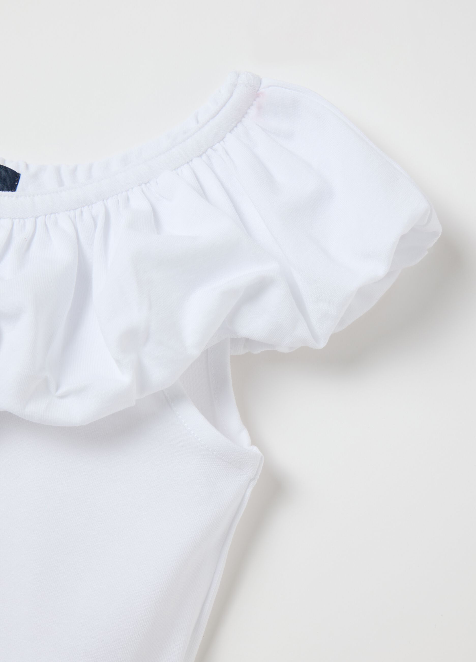 White T-shirt with ruffle neckline