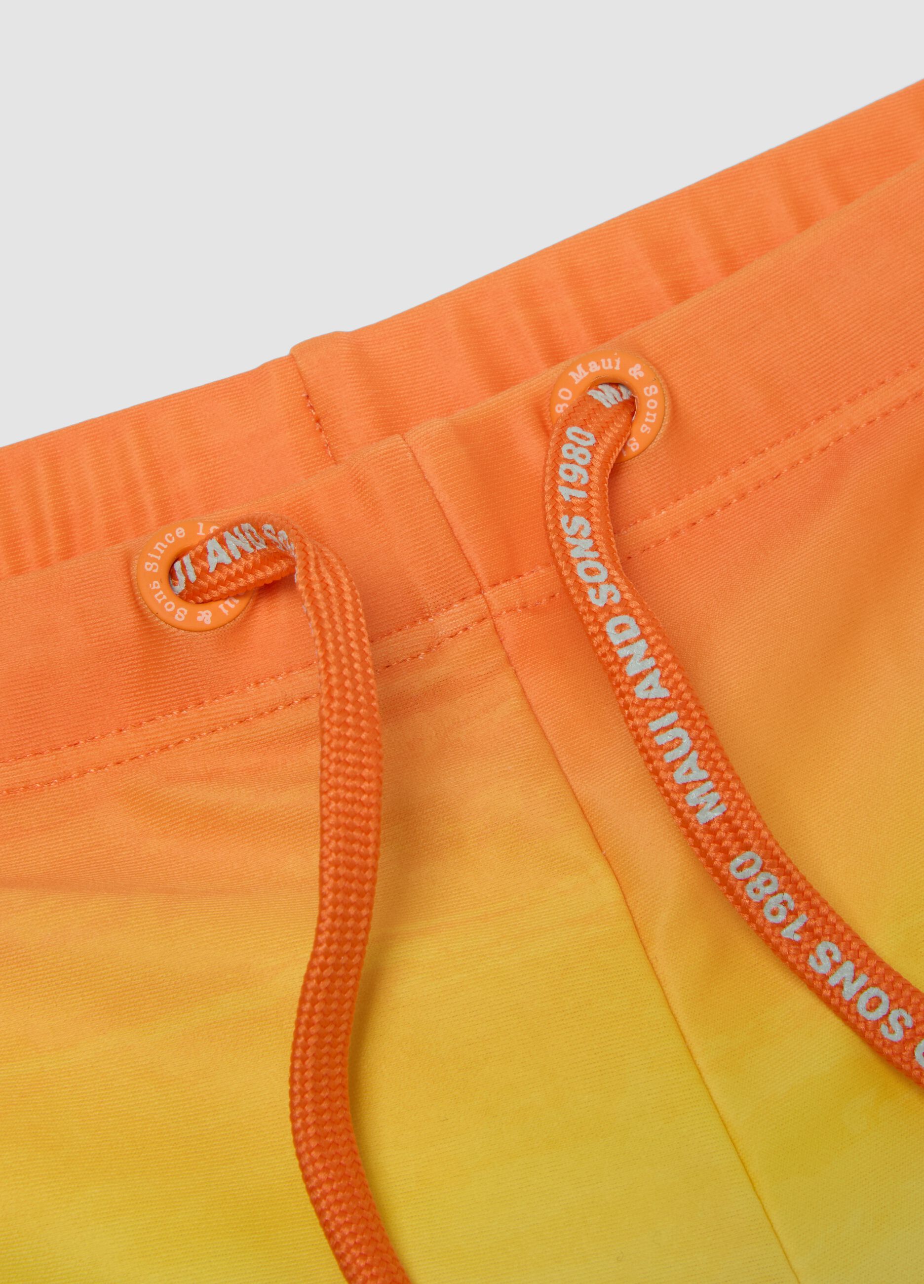 Kids&rsquo; multicolour stretch swim briefs with print