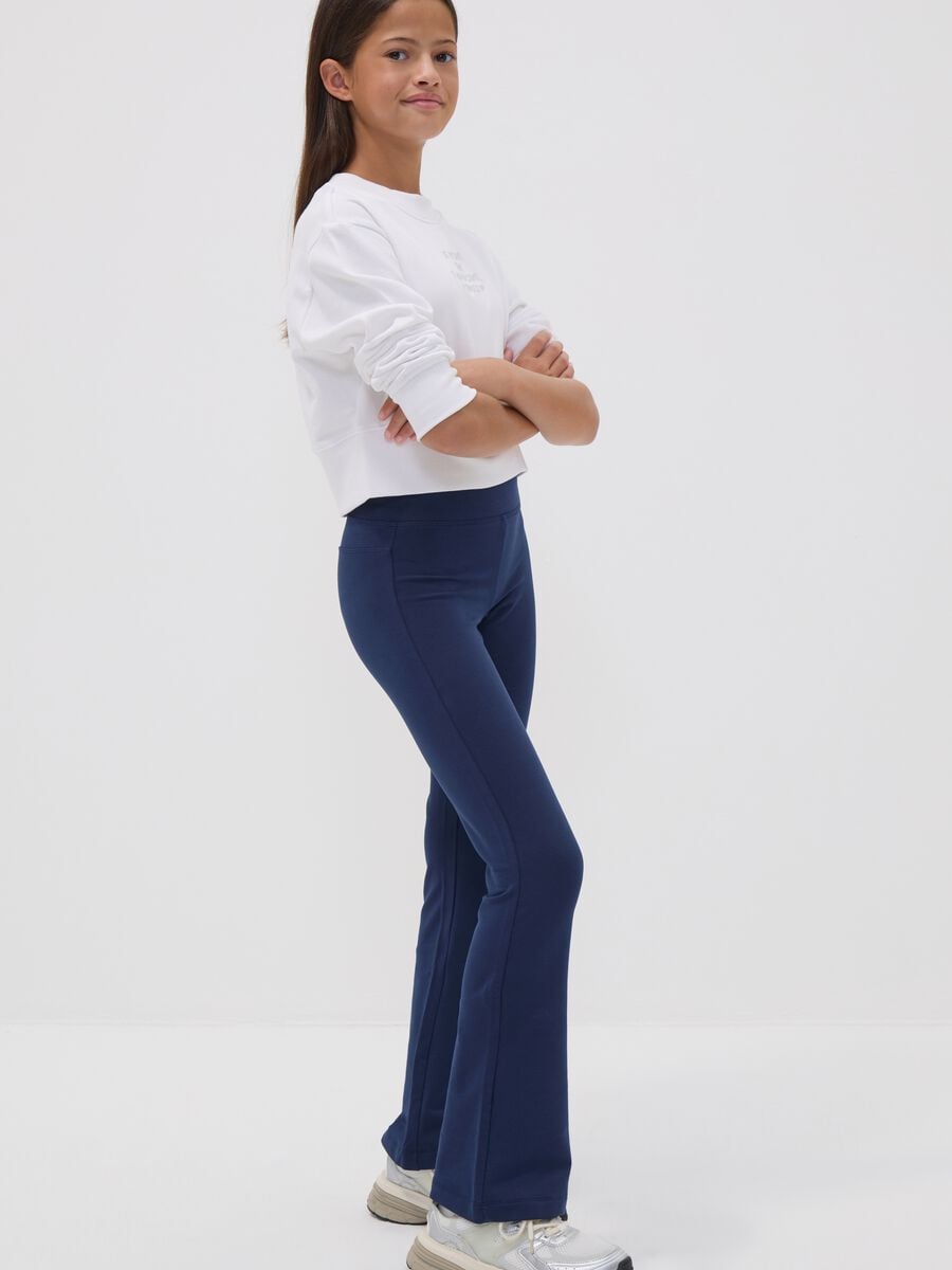 Girls&rsquo; blue flared trousers in stretch organic cotton_0